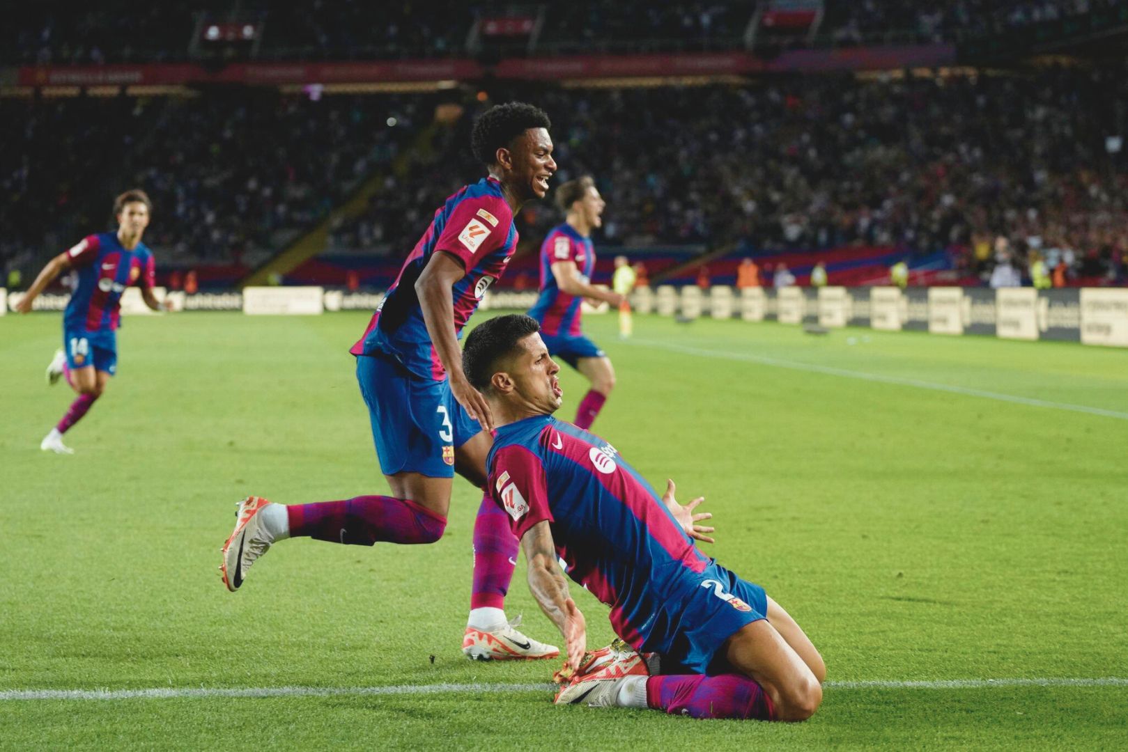 Barcelona players Cancelo and Balde celebrating goal against Celta Vigo