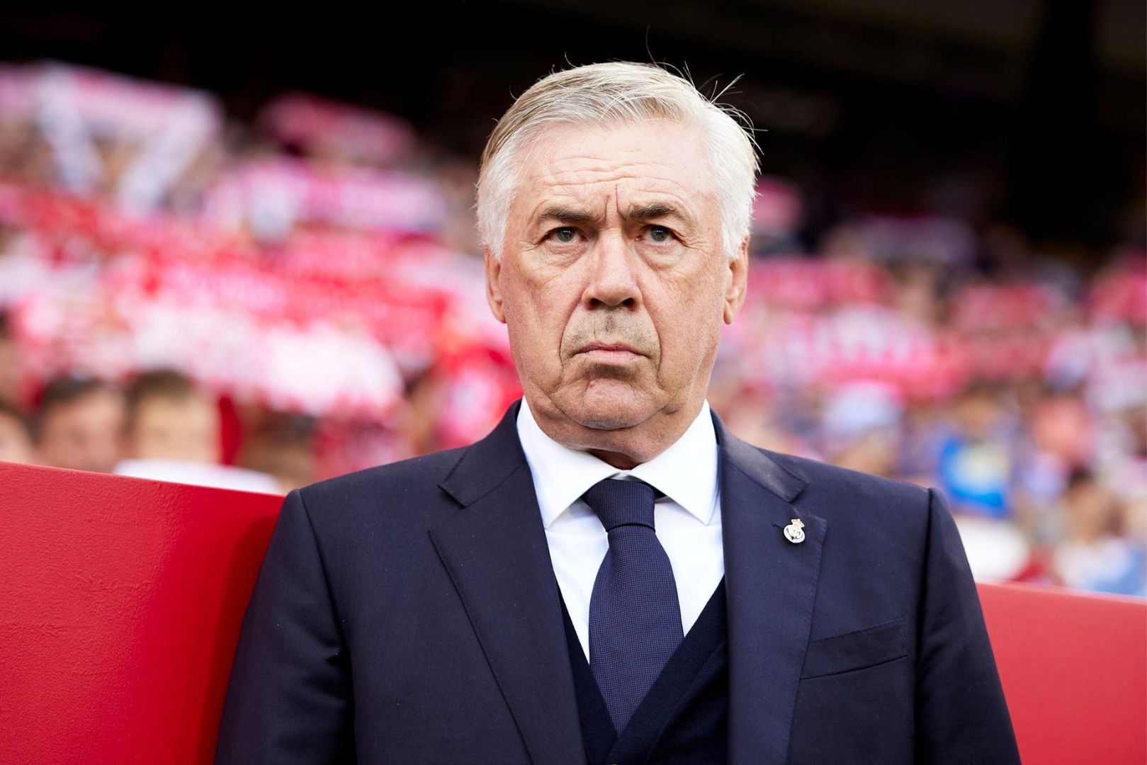 SEVILLE, SPAIN - OCTOBER 21: Carlo Ancelotti, Manager of Real Madrid looks on from the bench prior to the LaLiga EA Sports match between Sevilla FC and Real Madrid CF at Estadio Ramon Sanchez Pizjuan on October 21, 2023 in Seville, Spain.