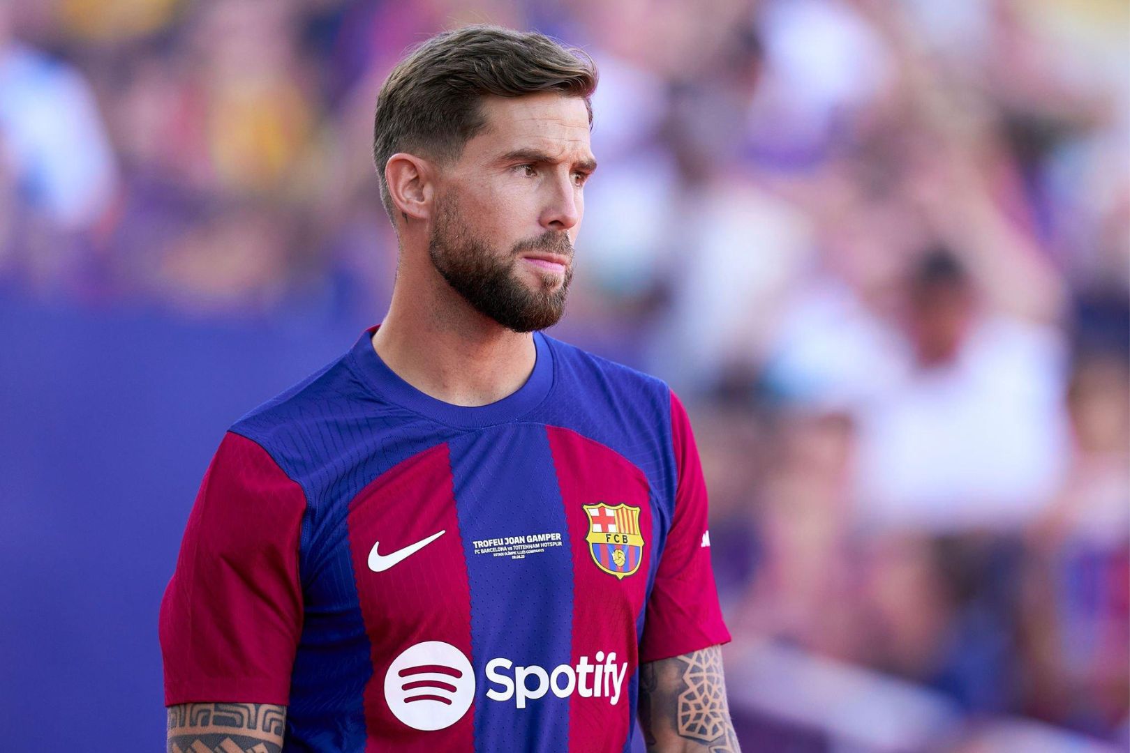 BARCELONA, SPAIN - AUGUST 08: Inigo Martinez of FC Barcelona comes onto the pitch ahead the Joan Gamper Trophy match between FC Barcelona and Tottenham Hotspur at Estadi Olimpic Lluis Companys on August 08, 2023 in Barcelona, Spain.