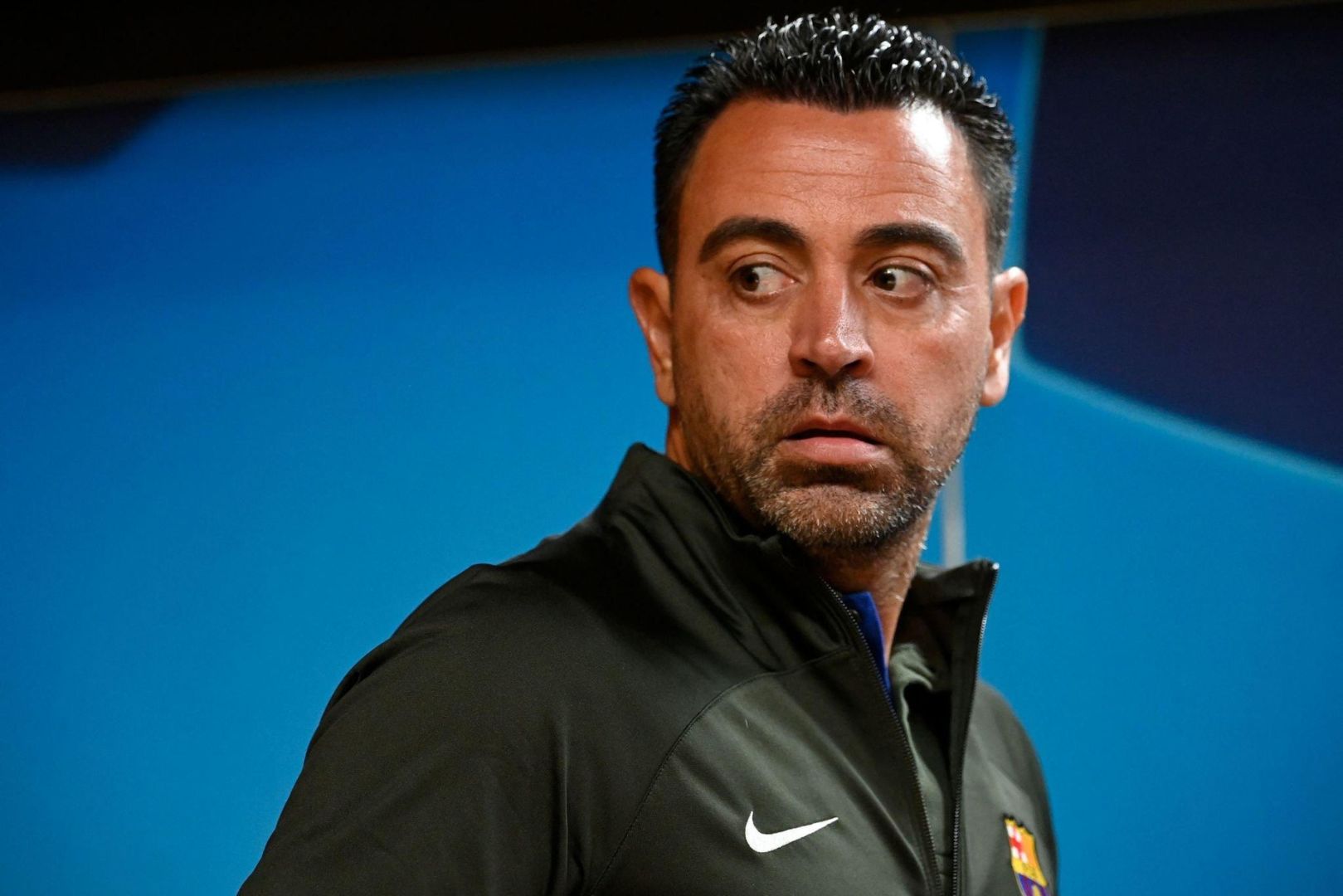 arcelona's Spanish coach Xavi looks on during a press conference at the Dragao stadium in Porto, on October 3, 2023, on the eve of the UEFA Champions League 1st round day 2 group H football match between FC Porto and FC Barcelona.
