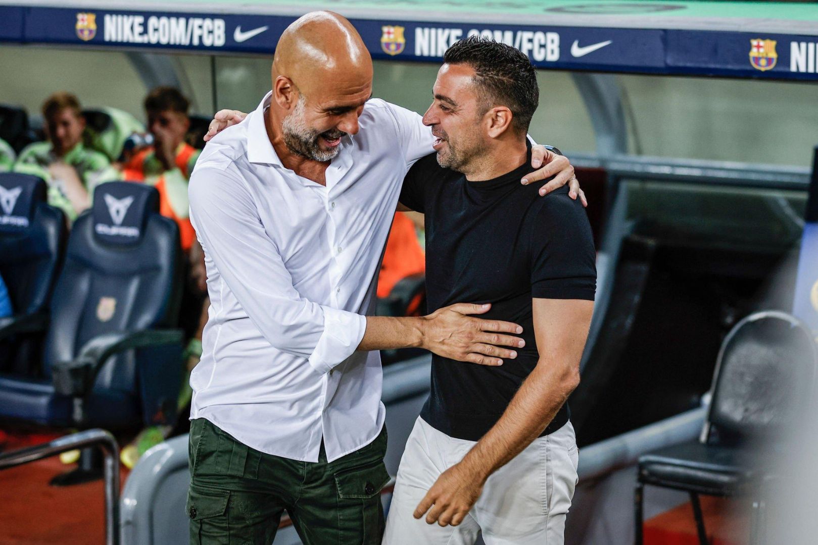 Pep Guardiola coach of Manchester City Xavi Hernandez coach of FC Barcelona during the friendly match between FC Barcelona v Manchester City to raise funds against ALS at the Spotify Camp Nou Stadium in Barcelona, Spain, on August 24th, 2022.