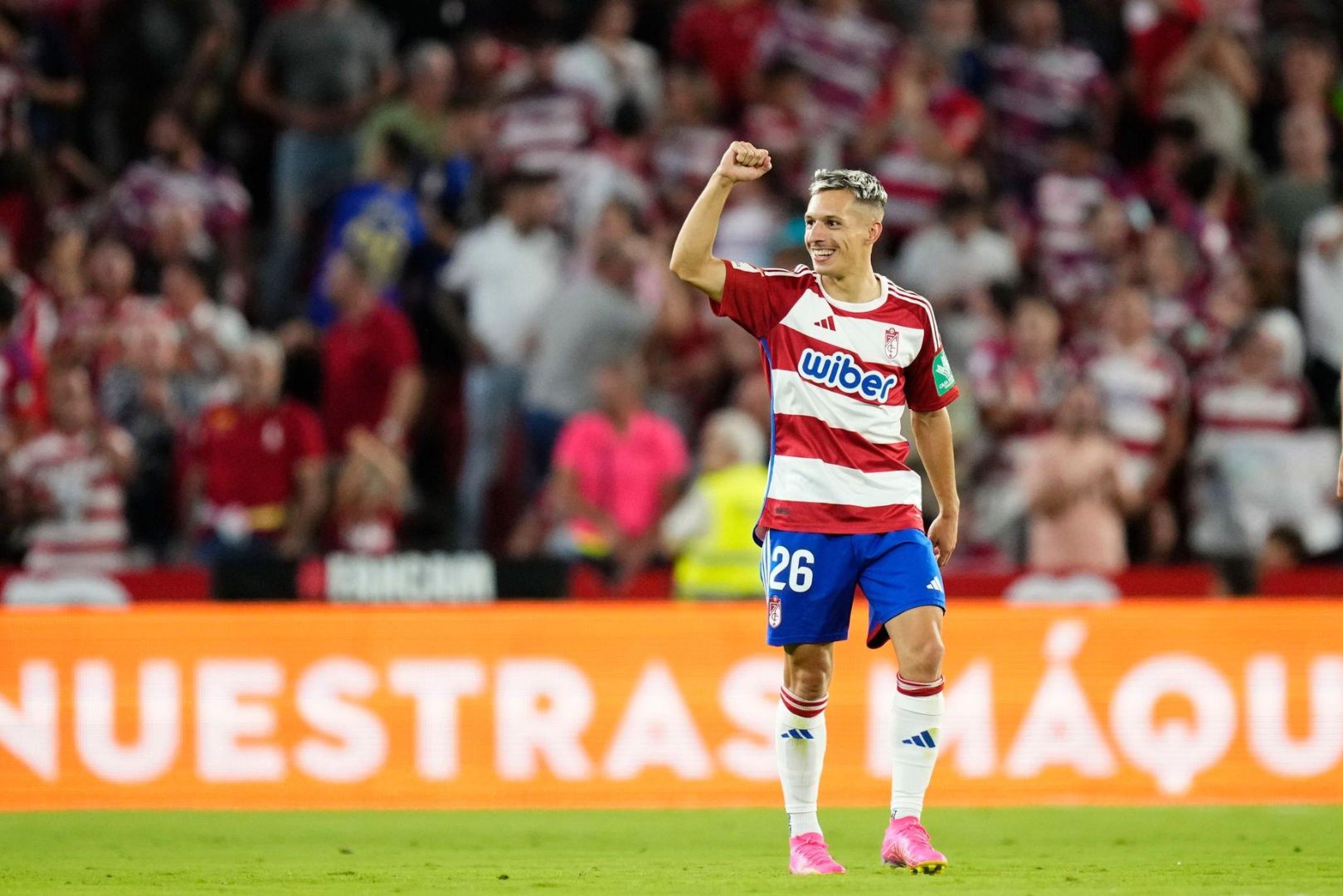 Bryan Zaragoza Left Winger of Granada and Spain celebrates after scoring his sides second goal during the LaLiga EA Sports match between Granada CF and FC Barcelona at Estadio Nuevo Los Carmenes on October 8, 2023 in Granada, Spain.