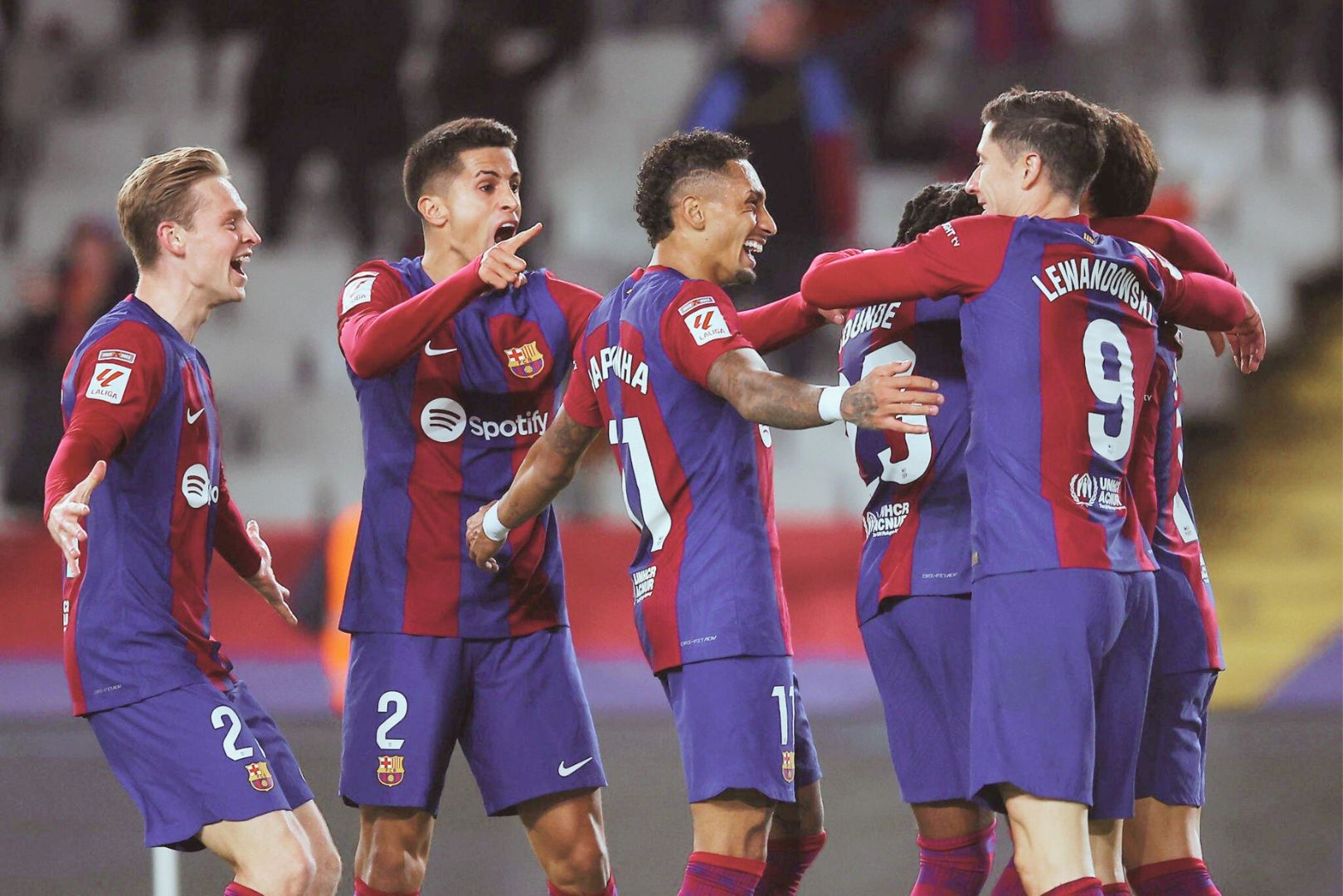 BARCELONA, SPAIN - DECEMBER 03: Joao Felix of FC Barcelona celebrates with teammates after scoring the team's first goal during the LaLiga EA Sports match between FC Barcelona and Atletico Madrid at Estadi Olimpic Lluis Companys on December 03, 2023 in Barcelona, Spain.