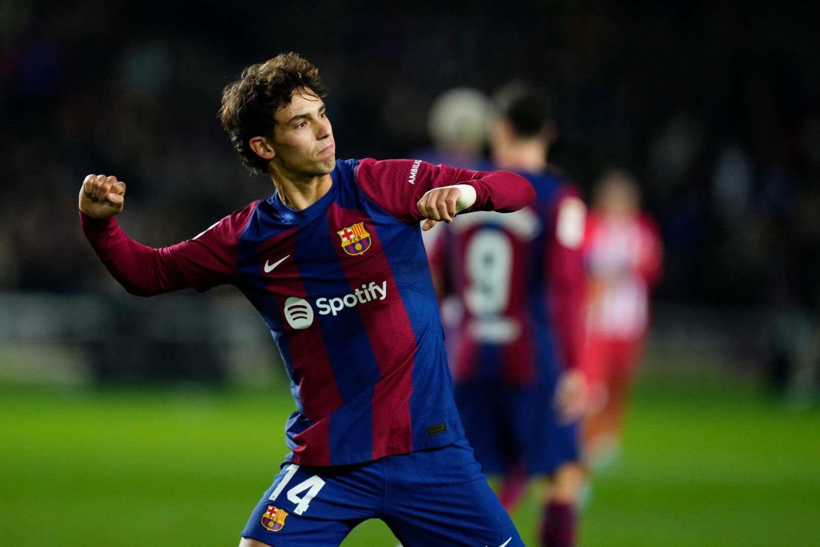 Joao Felix second striker of Barcelona and Portugal celebrates after scoring his sides first goal during the LaLiga EA Sports match between FC Barcelona and Atletico Madrid at Estadi Olimpic Lluis Companys on December 3, 2023 in Barcelona, Spain.