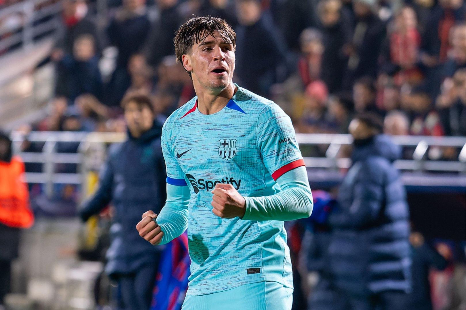 ANTWERPEN, BELGIUM - DECEMBER 13: Marc Guiu of FC Barcelona celebrates after scoring the team's second goal during the UEFA Champions League Group H match between Royal Antwerp FC and FC Barcelona at the Stadion Bosuil on December 13, 2023 in Antwerpen, Belgium.