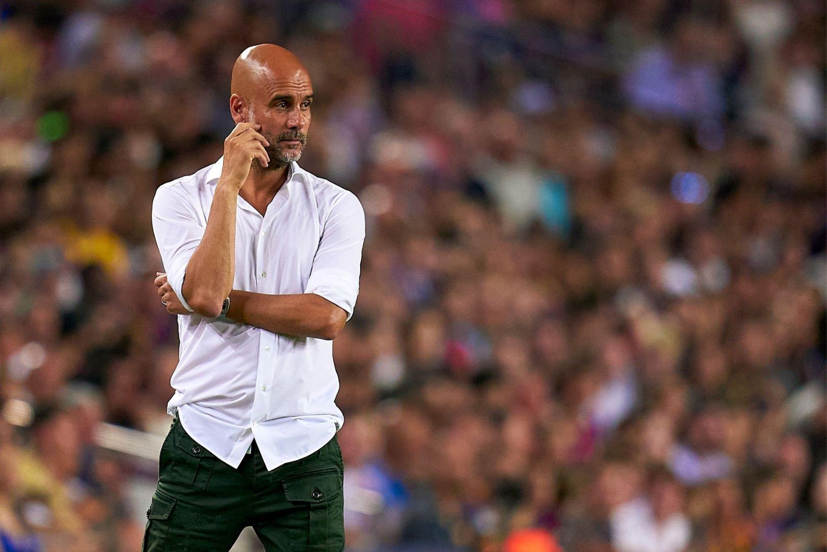 BARCELONA, SPAIN - AUGUST 24: Pep Guardiola, head coach of Manchester City during the friendly match between FC Barcelona and Manchester City at Spotify Camp Nou on August 24, 2022 in Barcelona, Spain.