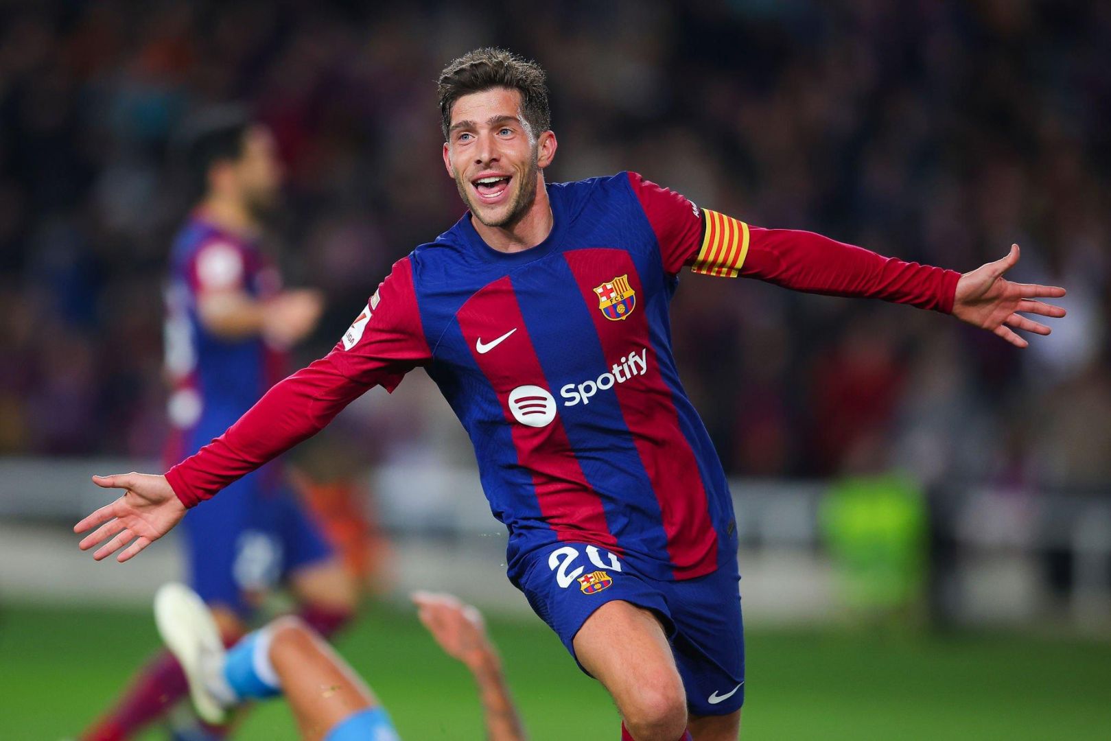 BARCELONA, SPAIN - DECEMBER 20: Sergi Roberto of FC Barcelona celebrates after scoring the team's third goal during the LaLiga EA Sports match between FC Barcelona and UD Almeria at Estadi Olimpic Lluis Companys on December 20, 2023 in Barcelona, Spain.