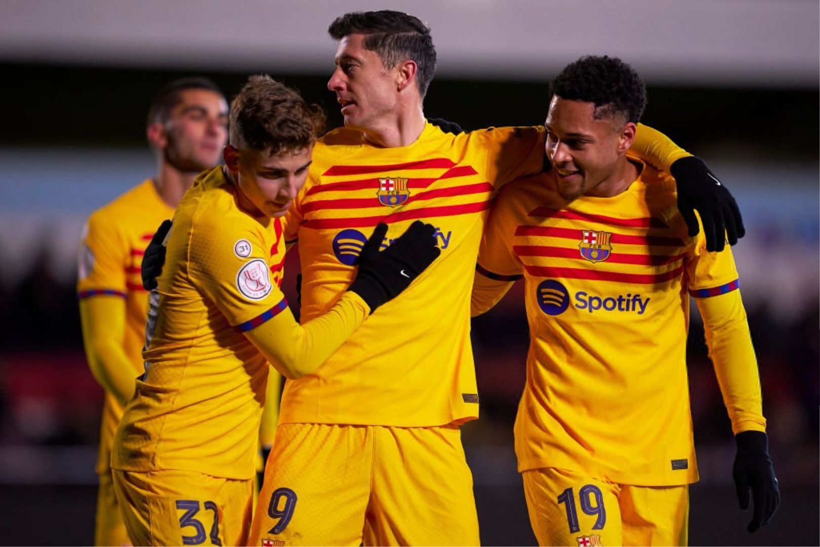BARBASTRO, SPAIN - JANUARY 07: Robert Lewandowski of FC Barcelona celebrates with teammates after scoring his team's third goal during the Copa del Rey round of 32 match between UD Barbastro and FC Barcelona at Campo Municipal de Deportes on January 07, 2024 in Barbastro, Spain.