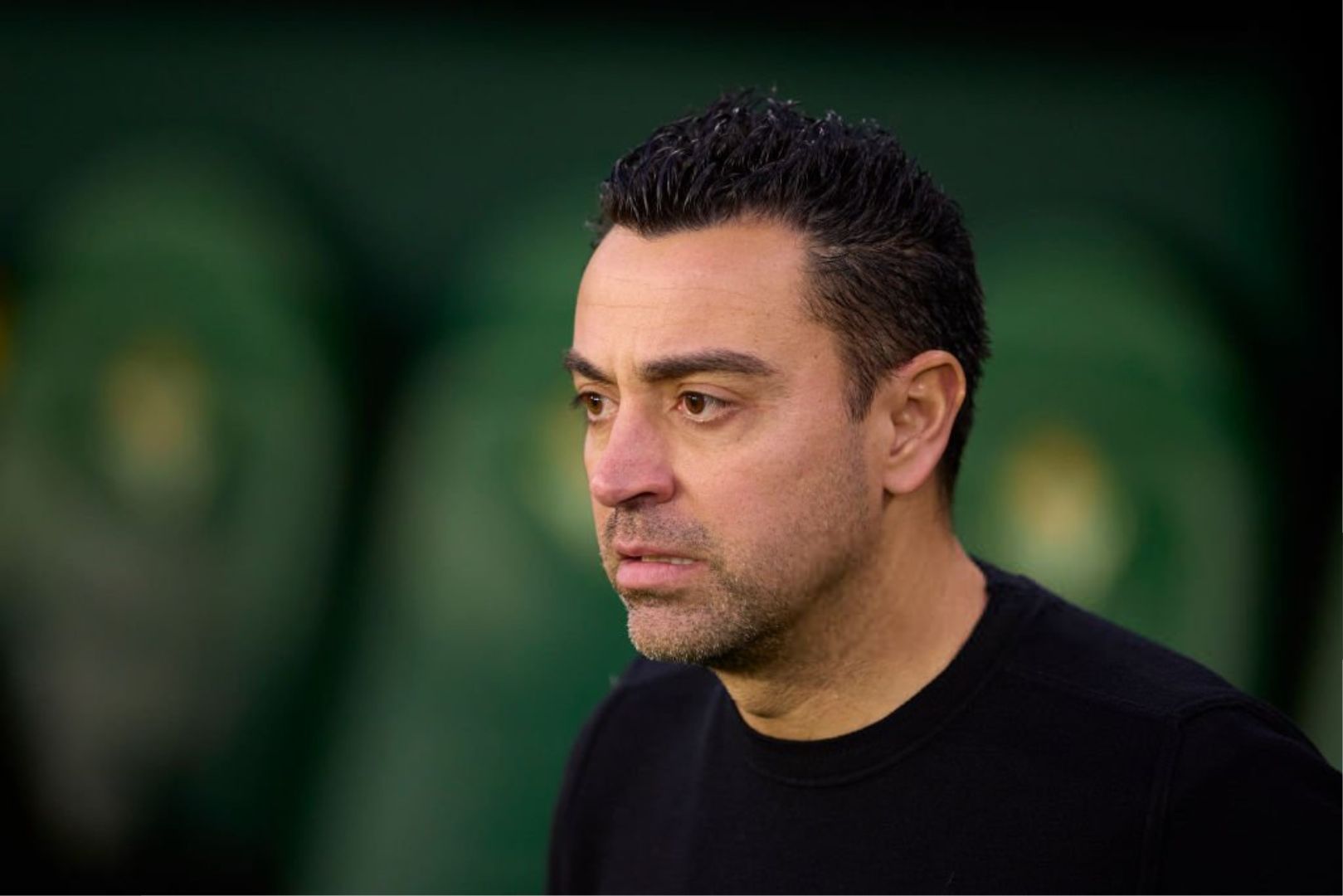 SEVILLE, SPAIN - JANUARY 21: Xavi Hernandez, manager of FC Barcelona looks on during the LaLiga EA Sports match between Real Betis and FC Barcelona at Estadio Benito Villamarin on January 21, 2024 in Seville, Spain.