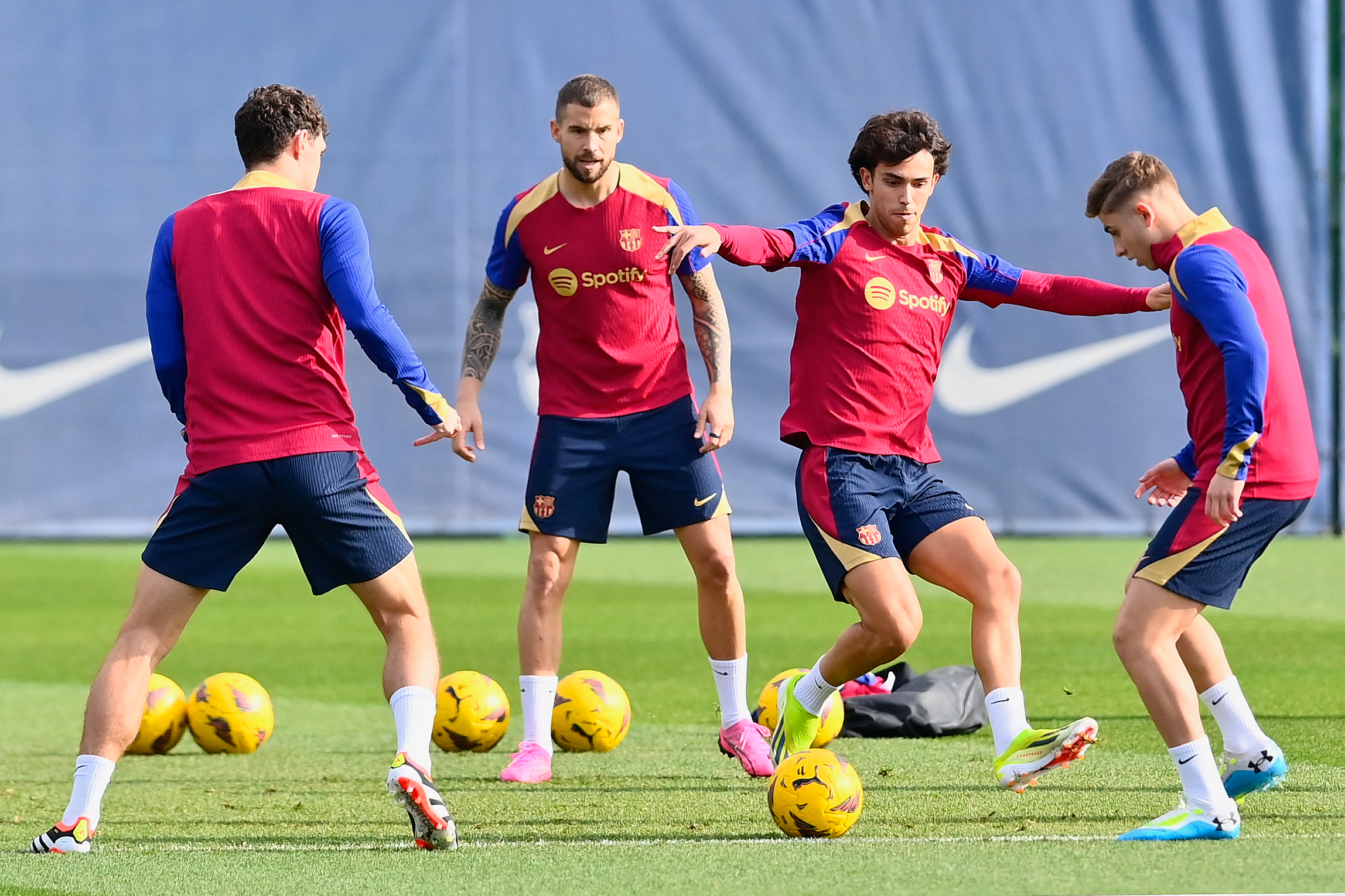 Barcelona's Portuguese forward #14 Joao Felix (C) and teammates attend a training session at the Joan Gamper training ground in Sant Joan Despi, near Barcelona, on January 30, 2024. Only a few months after lifting the Spanish title, Barcelona coach Xavi Hernandez dramatically announced he would walk away from the club at the end of the season. After Villarreal stunned Barcelona on January 28 with a 5-3 win which left the champions third, and 10 points behind La Liga leaders Real Madrid, Xavi said he was stepping down in June.