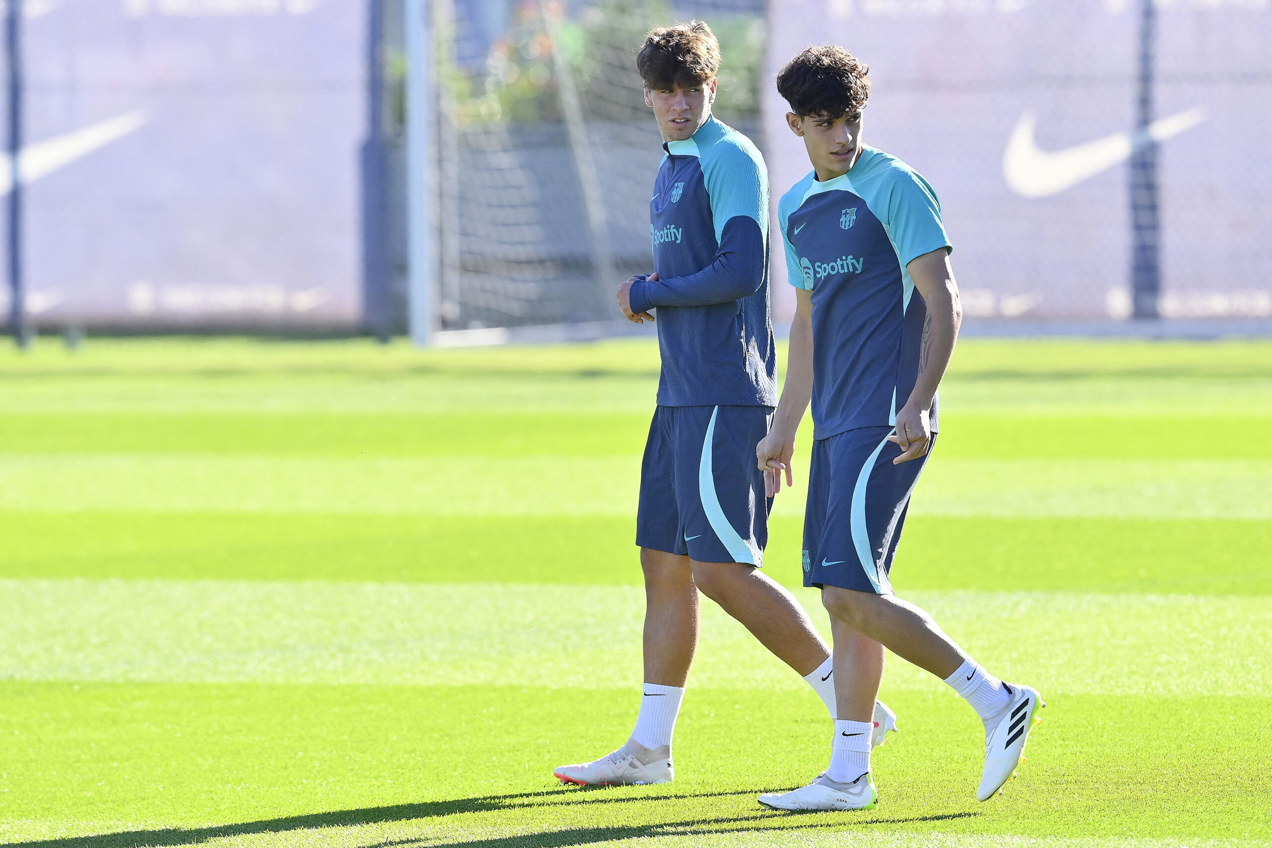 Barcelona's Spanish forward #38 Marc Guiu (L) and Spanish defender Hector Fort arrive for a training session at the Joan Gamper training ground in Sant Joan Despi, near Barcelona, on October 24, 2023, on the eve of their UEFA Champions League 1st round Group H football match against Shakhtar Donetsk.