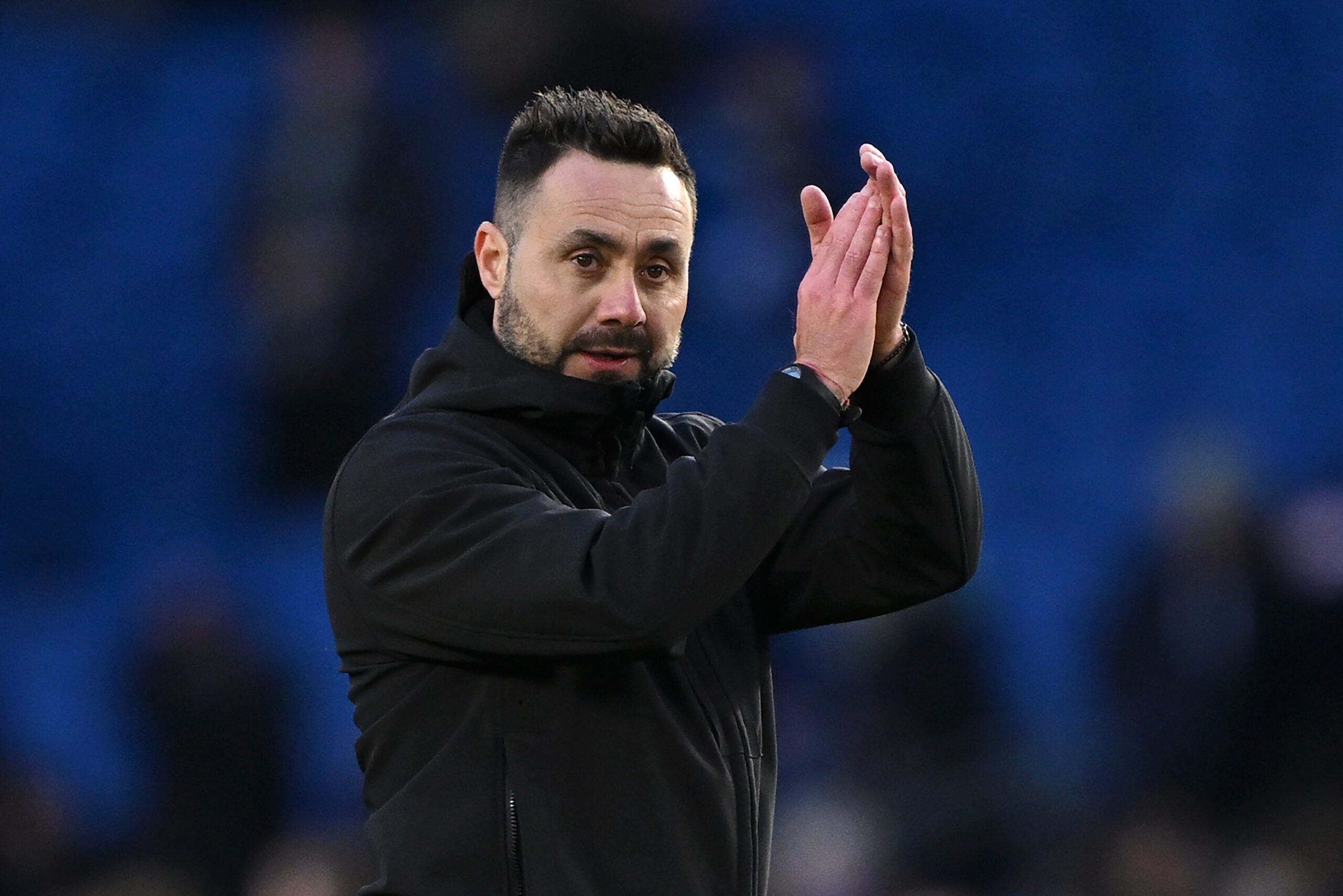 BRIGHTON, ENGLAND - FEBRUARY 24: Roberto De Zerbi, Manager of Brighton & Hove Albion, applauds the fans after the draw in the Premier League match between Brighton & Hove Albion and Everton FC at the American Express Community Stadium on February 24, 2024 in Brighton, England.
