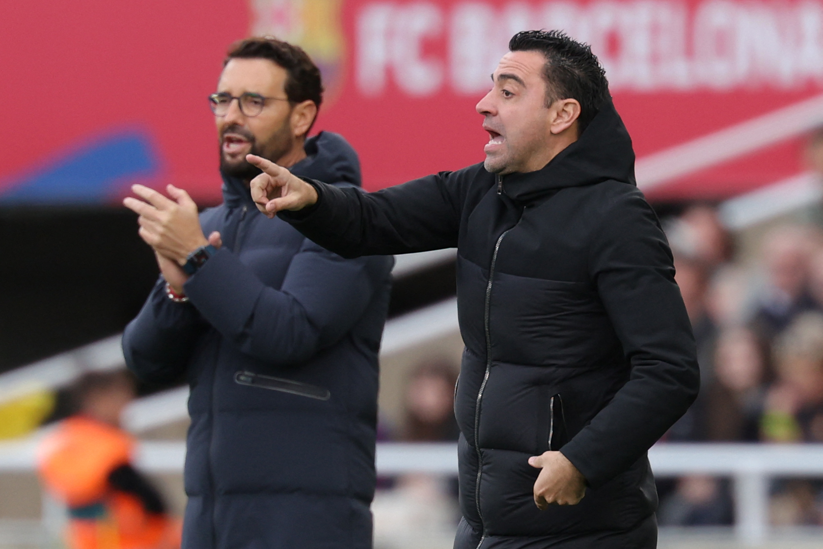 Barcelona's Spanish coach Xavi gestures on the sidelines during the Spanish league football match between FC Barcelona and Getafe CF at the Estadi Olimpic Lluis Companys in Barcelona on February 24, 2024.