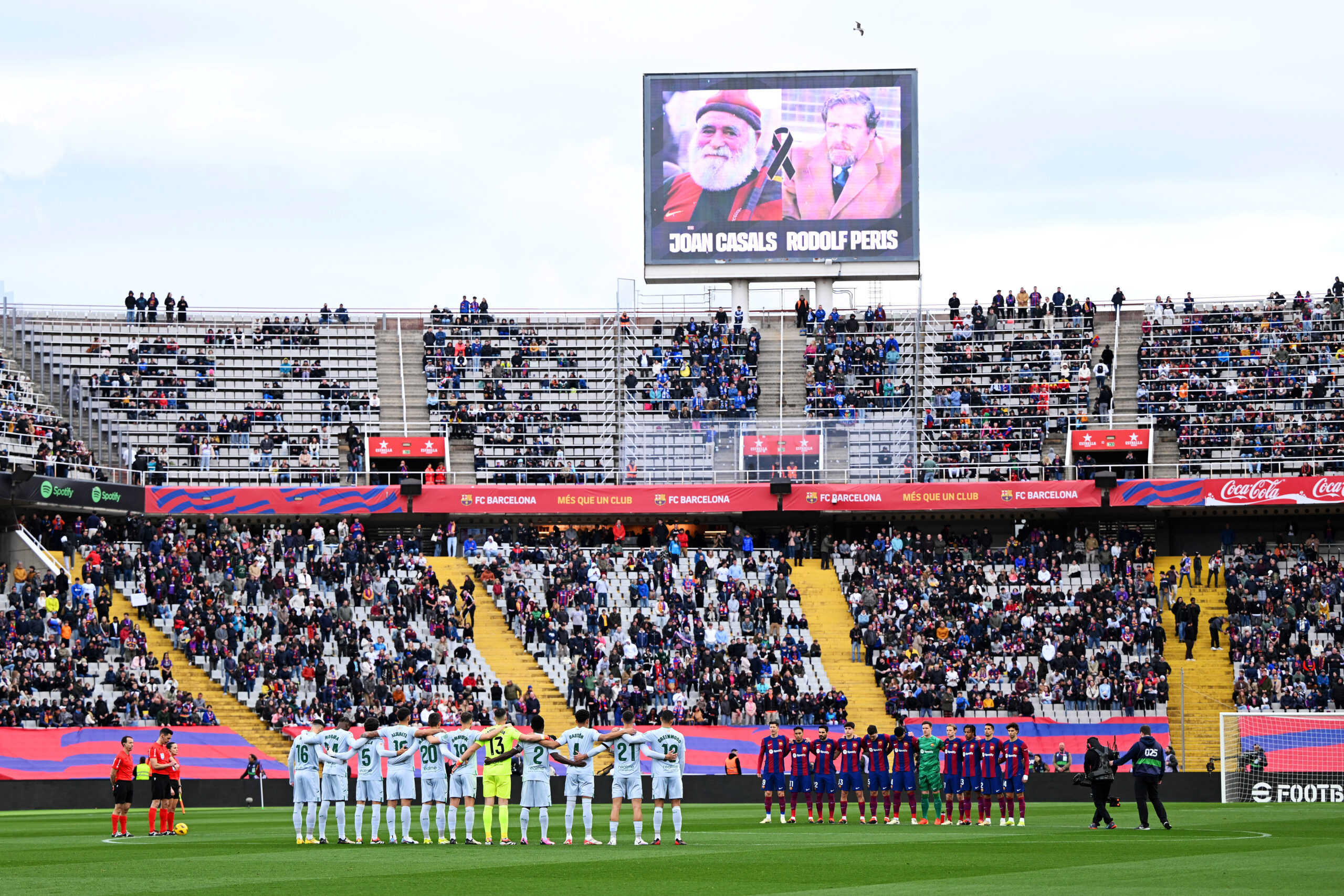 BARCELONA, SPAIN - FEBRUARY 24: Players and Officials participate in a minute silence to commemorate the passing of FC Barcelona fans Joan Casals and Rodolf Peris during the LaLiga EA Sports match between FC Barcelona and Getafe CF at Estadi Olimpic Lluis Companys on February 24, 2024 in Barcelona, Spain.