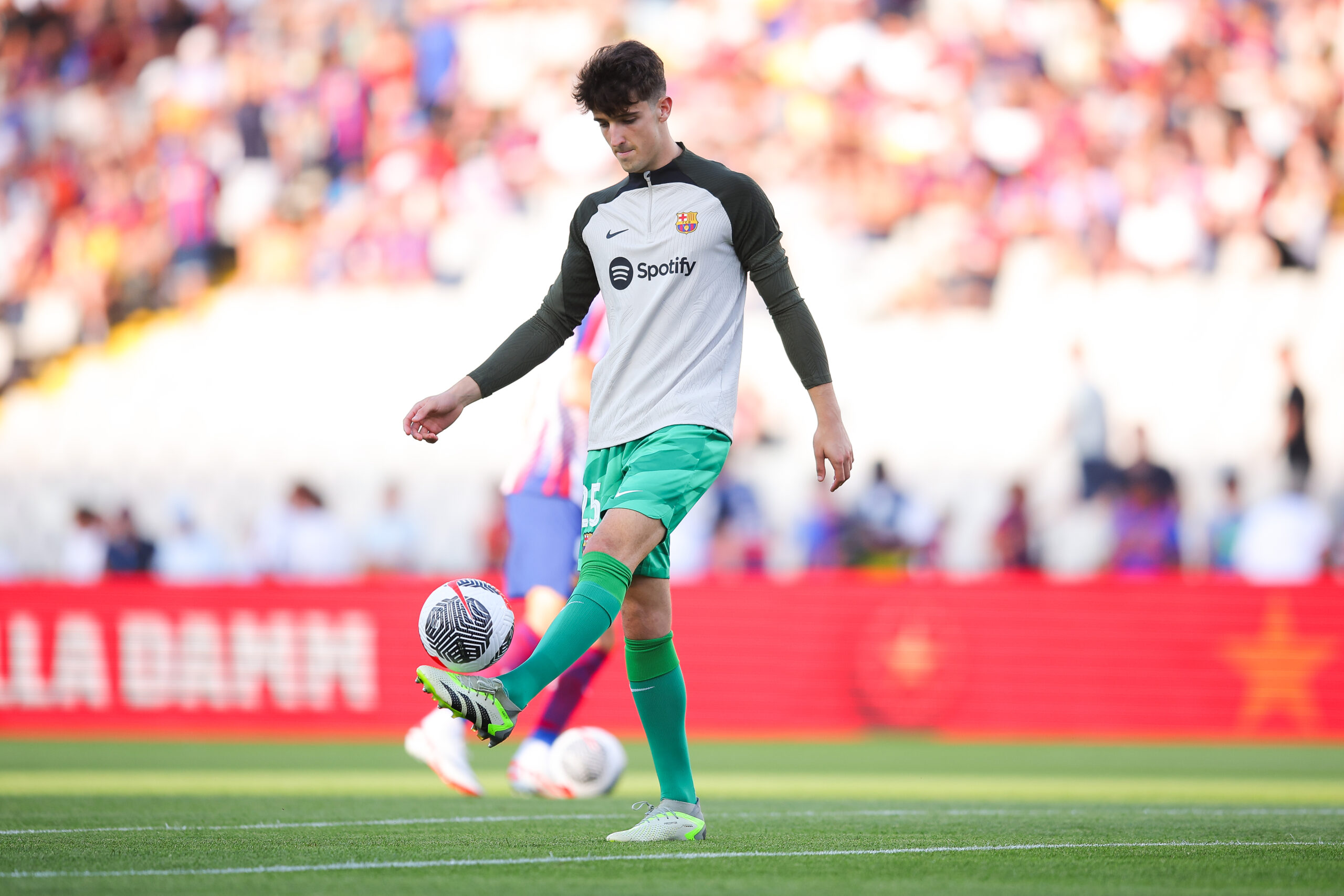 BARCELONA, SPAIN - AUGUST 08: Ander Astralaga of FC Barcelona warm up prior to the Joan Gamper Trophy match between FC Barcelona and Tottenham Hotspur at Estadi Olimpic Lluis Companys on August 08, 2023 in Barcelona, Spain.