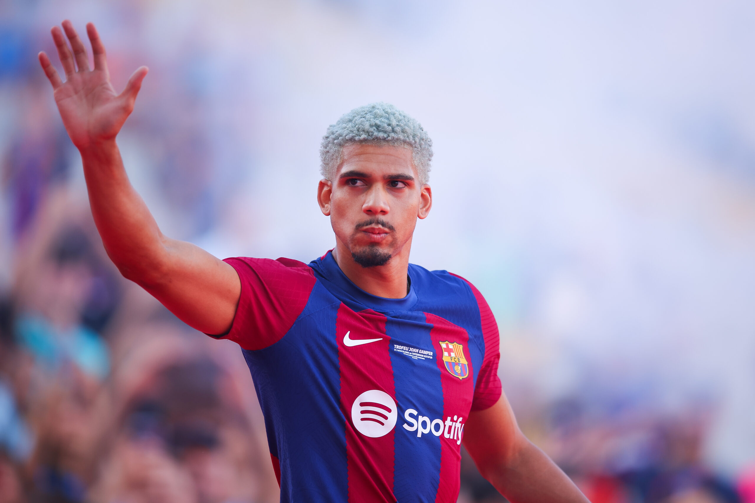 BARCELONA, SPAIN - AUGUST 08: Ronald Araujo of FC Barcelona waves the supporters prior to the Joan Gamper Trophy match between FC Barcelona and Tottenham Hotspur at Estadi Olimpic Lluis Companys on August 08, 2023 in Barcelona, Spain.