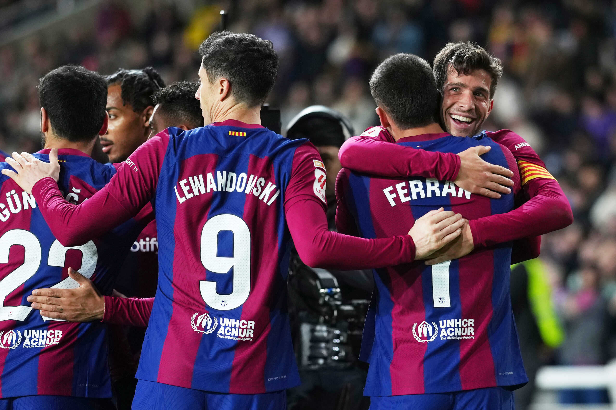 BARCELONA, SPAIN - DECEMBER 20: Sergi Roberto of FC Barcelona celebrates with teammates after scoring their team's second goal during the LaLiga EA Sports match between FC Barcelona and UD Almeria at Estadi Olimpic Lluis Companys on December 20, 2023 in Barcelona, Spain.