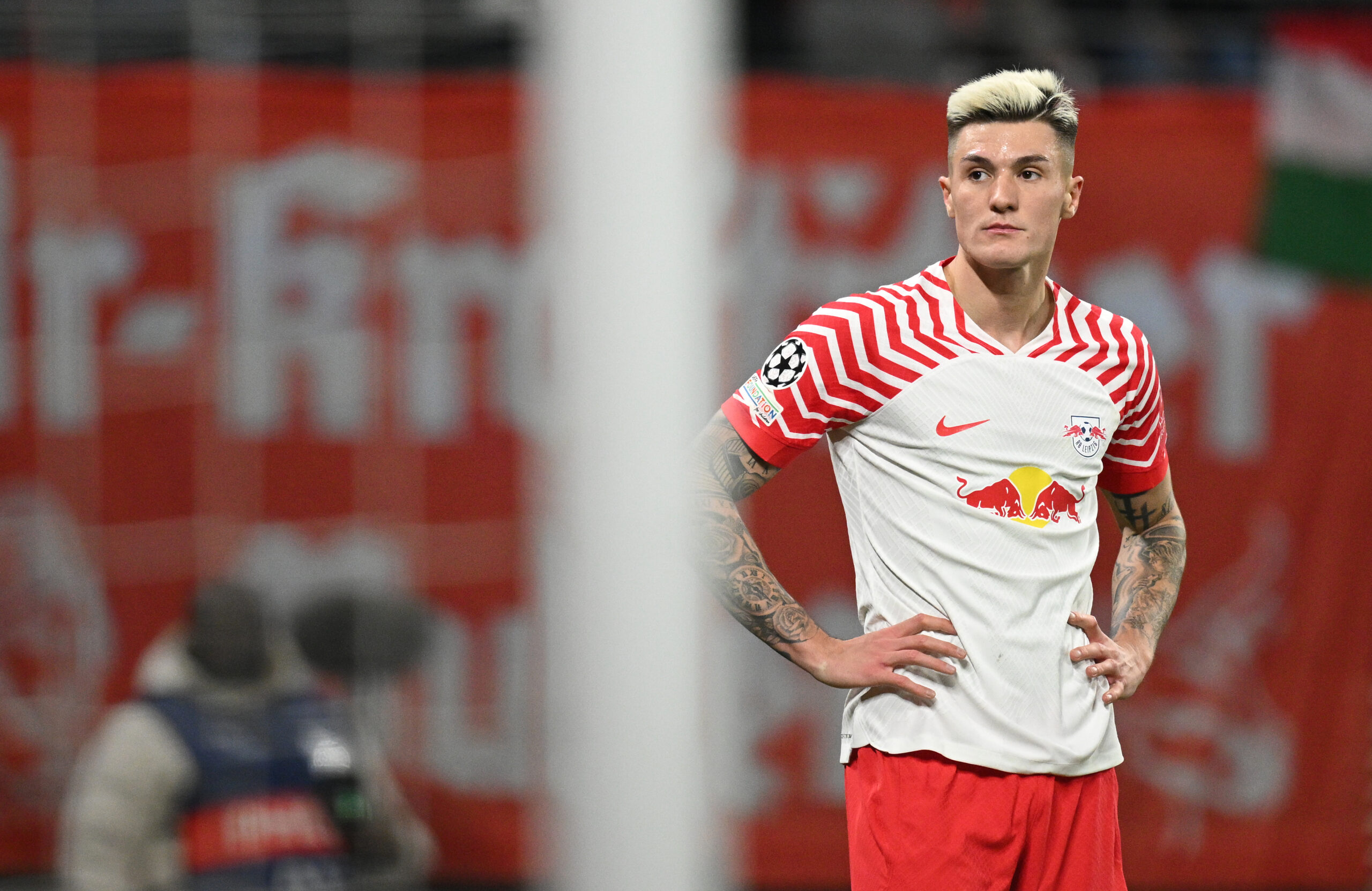 LEIPZIG, GERMANY - FEBRUARY 13: Benjamin Sesko of Leipzig reacts to a missed chance during the UEFA Champions League 2023/24 round of 16 first leg match between RB Leipzig and Real Madrid CF at Red Bull Arena on February 13, 2024 in Leipzig, Germany.