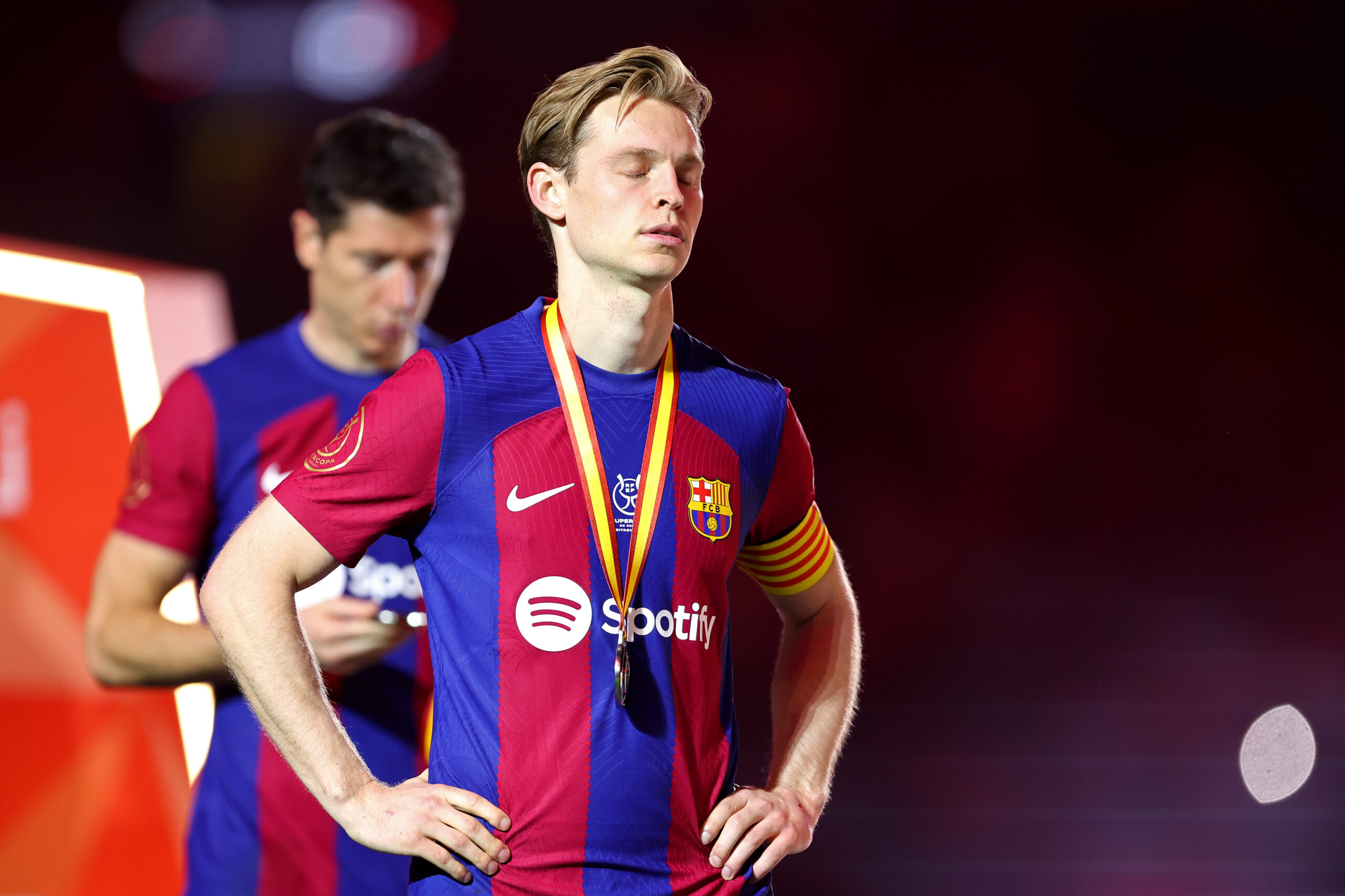 RIYADH, SAUDI ARABIA - JANUARY 14: Frenkie de Jong of FC Barcelona looks dejected with his runners-up medal after the team's defeat in the Super Copa de España Final match between Real Madrid and FC Barcelona on January 14, 2024 in Riyadh, Saudi Arabia.