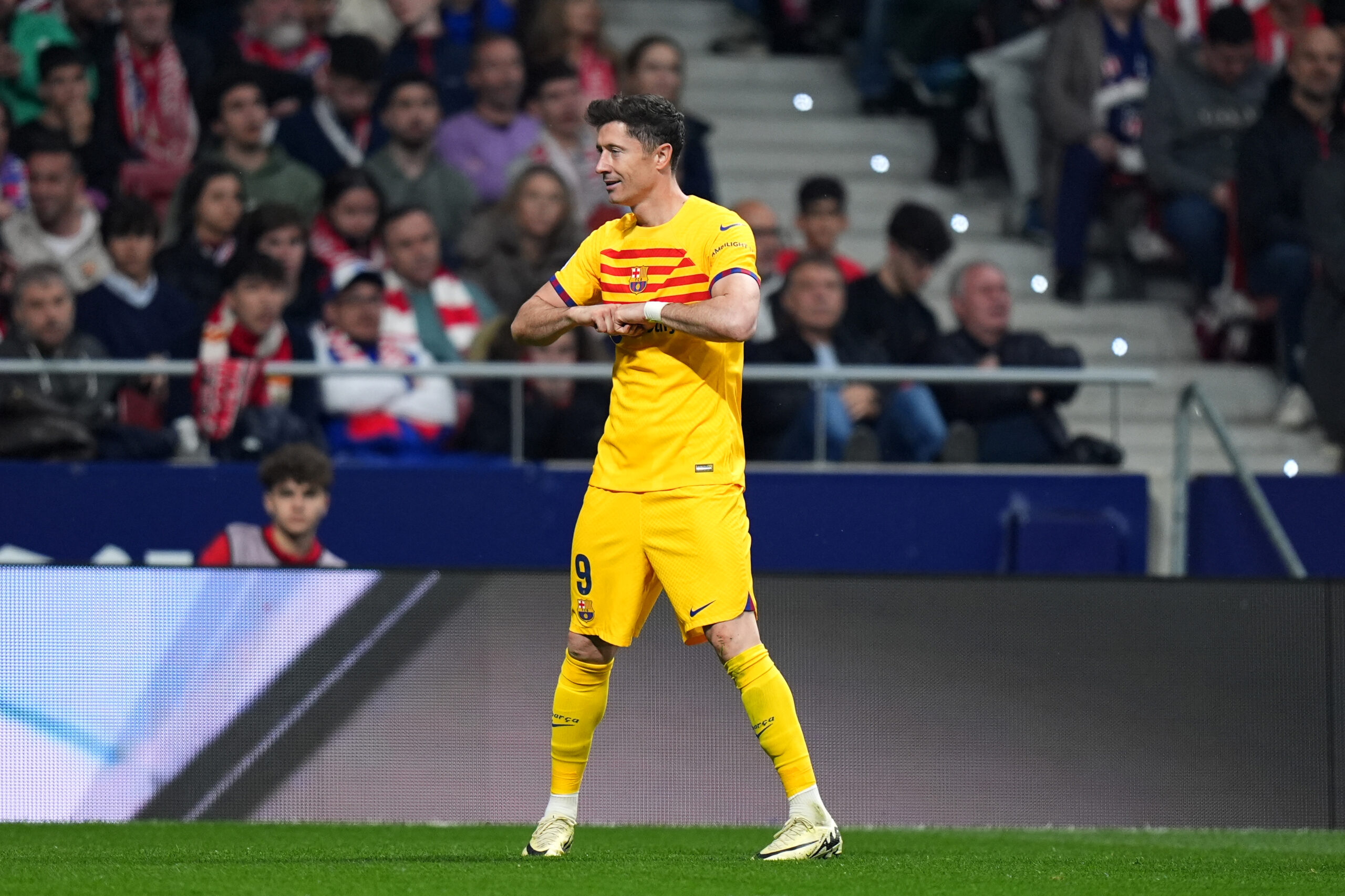 MADRID, SPAIN - MARCH 17: Robert Lewandowski of FC Barcelona celebrates scoring his team's second goal during the LaLiga EA Sports match between Atletico Madrid and FC Barcelona at Civitas Metropolitano Stadium on March 17, 2024 in Madrid, Spain.