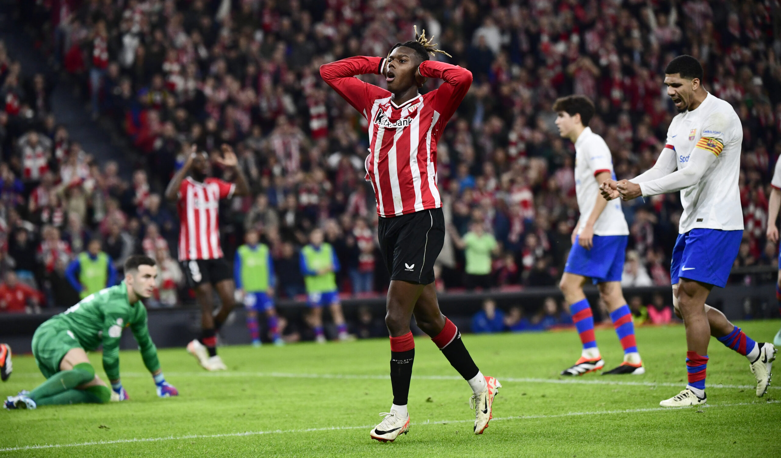 Athletic Bilbao's Spanish forward #11 Nico Williams reacts to missing a goal opportunity during the Spanish Copa del Rey (King's Cup) quarter final football match between Athletic Club Bilbao and FC Barcelona at the San Mames stadium in Bilbao on January 24, 2024.