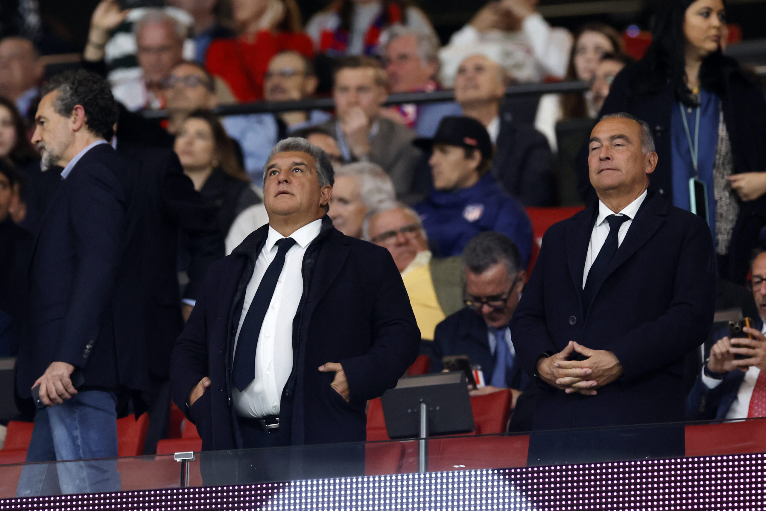 Barcelona president Joan Laporta (C) is pictured before the Spanish league football match between Club Atletico de Madrid and FC Barcelona at the Metropolitano stadium in Madrid on March 17, 2024.