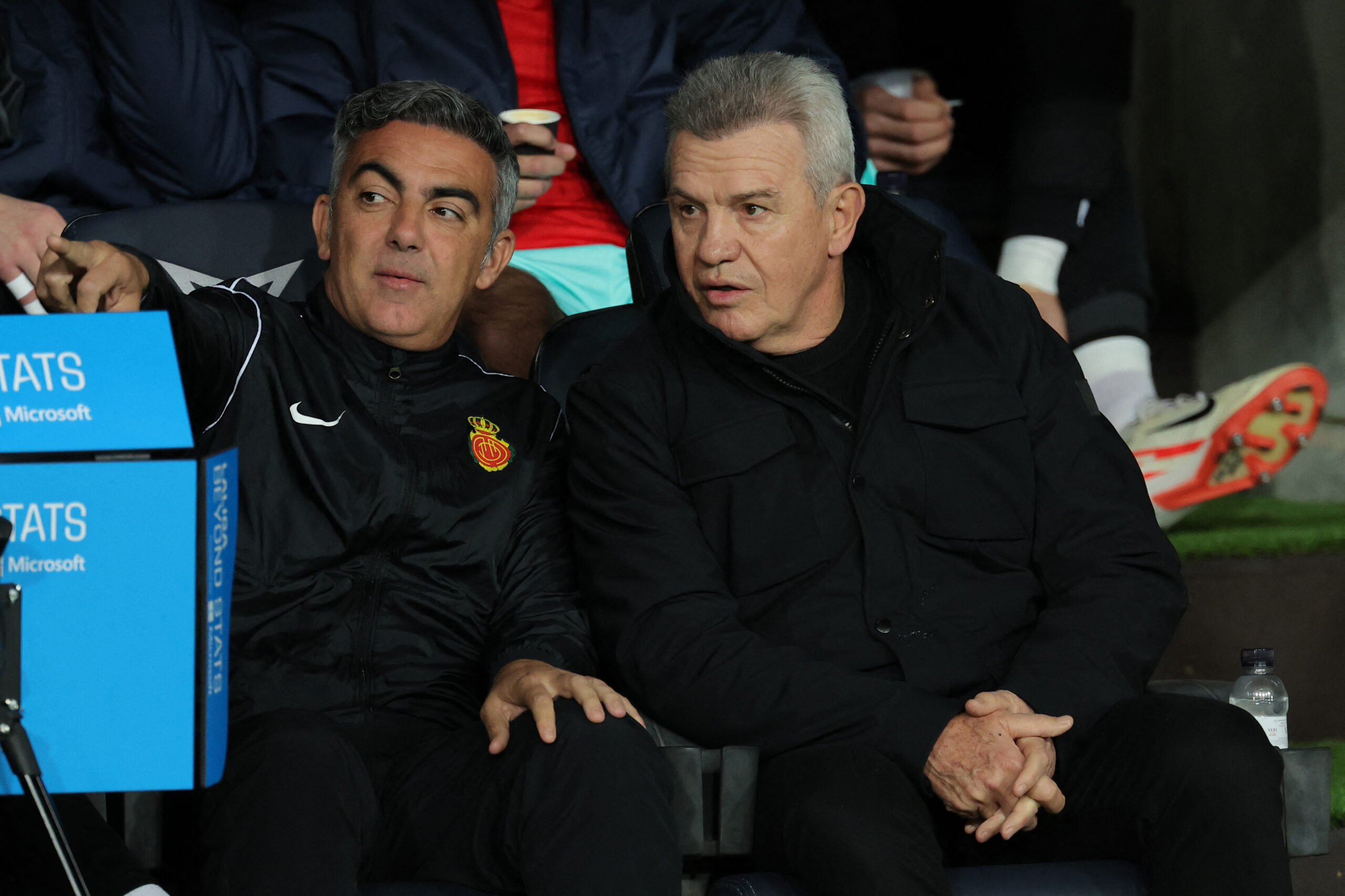Real Mallorca's Mexican coach Javier Aguirre (R) looks on before the Spanish league football match between FC Barcelona and RCD Mallorca at the Estadi Olimpic Lluis Companys in Barcelona on March 8, 2024.