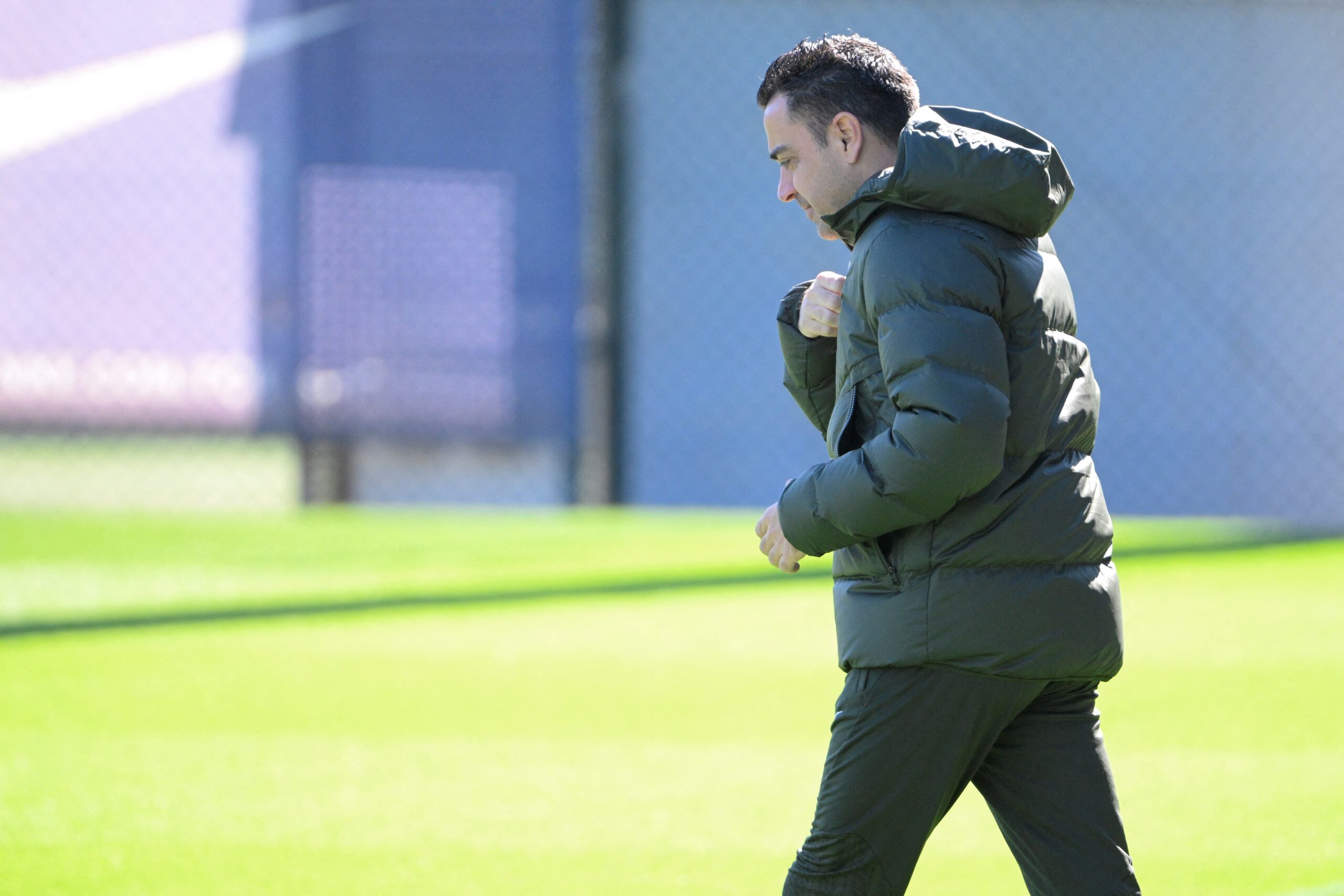 Barcelona's Spanish coach Xavi arrives for a training session on the eve of their UEFA Champions League last 16 second leg football match against SSC Napoli at the training center in Barcelona on March 11, 2024.