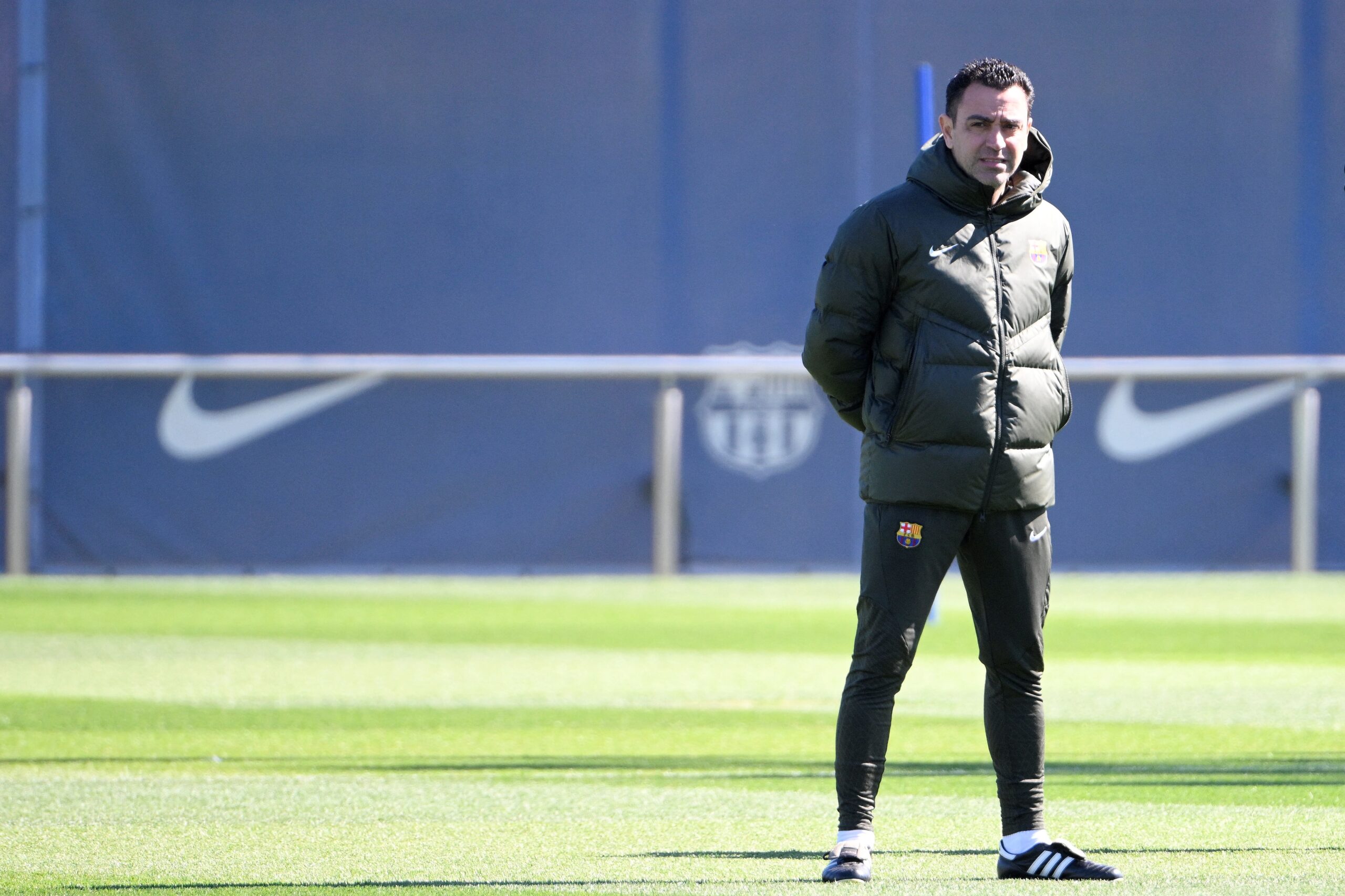 Barcelona's Spanish coach Xavi looks on during a training session on the eve of their UEFA Champions League last 16 second leg football match against SSC Napoli at the training center in Barcelona on March 11, 2024.