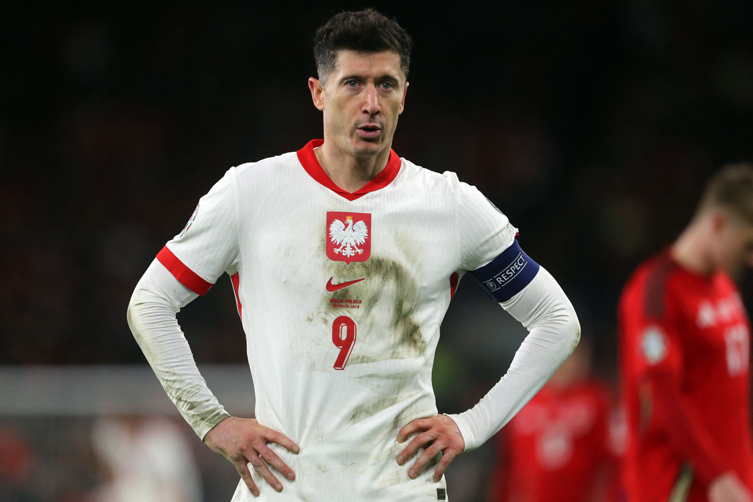 Poland's forward #09 Robert Lewandowski reacts during the UEFA EURO 2024 qualifier play-off final first leg football match between Wales and Poland at the Cardiff City Stadium, in Cardiff, on March 26, 2024.