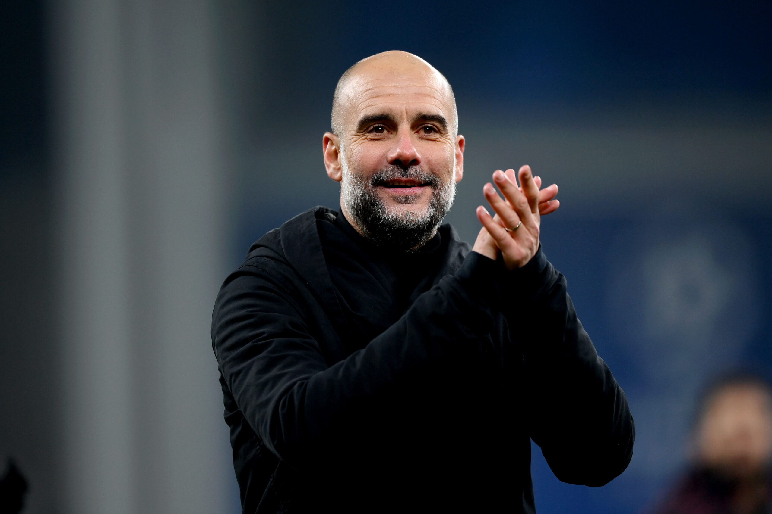 COPENHAGEN, DENMARK - FEBRUARY 13: Pep Guardiola, Manager of Manchester City, applauds the fans at full-time following the team's victory in the UEFA Champions League 2023/24 round of 16 first leg match between F.C. Copenhagen and Manchester City at Parken Stadium on February 13, 2024 in Copenhagen, Denmark.