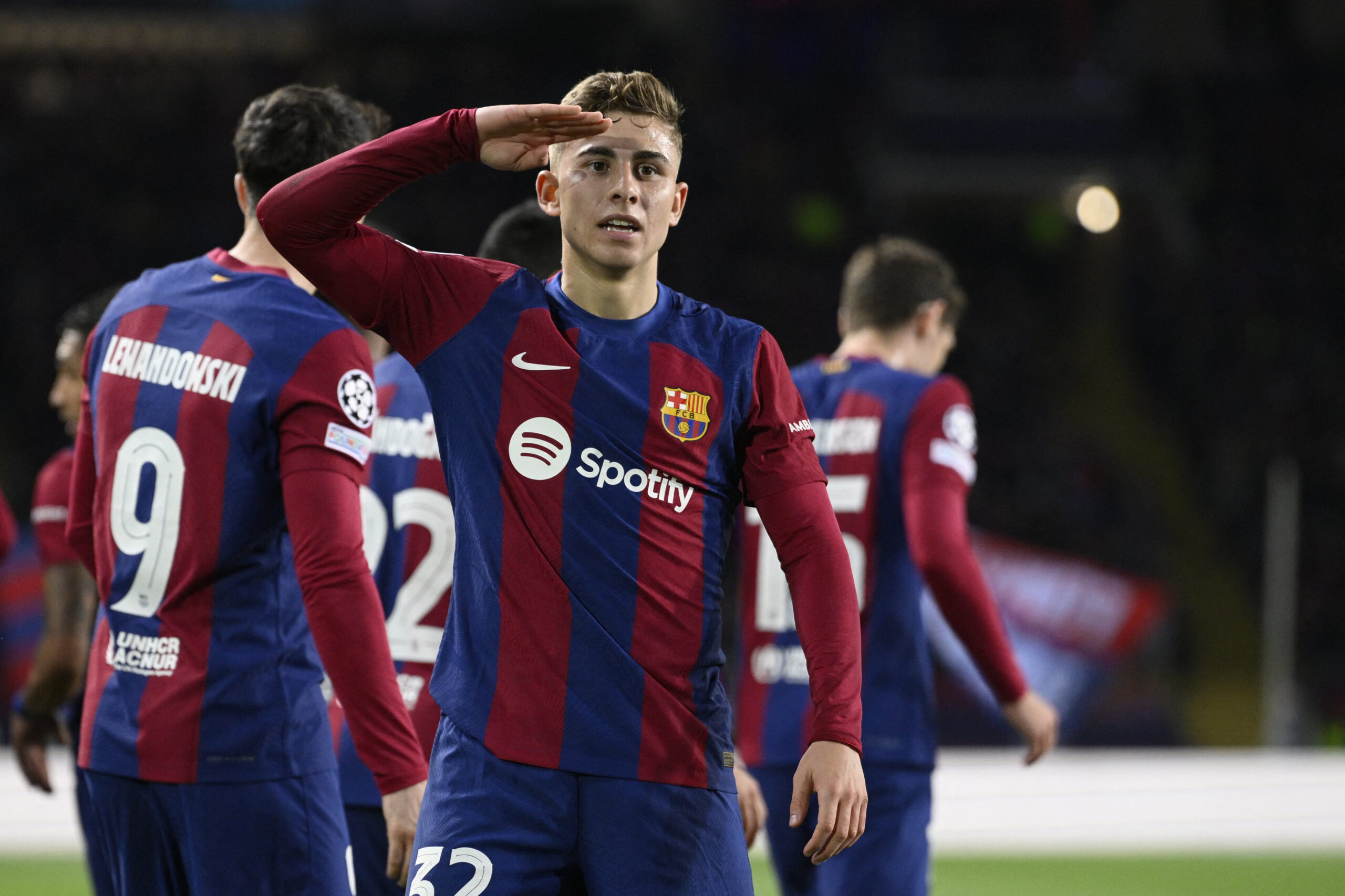 TOPSHOT - Barcelona's Spanish midfielder #32 Fermin Lopez celebrates scoring the opening goal during the UEFA Champions League last 16 second leg football match between FC Barcelona and SSC Napoli at the Estadi Olimpic Lluis Companys in Barcelona on March 12, 2024.