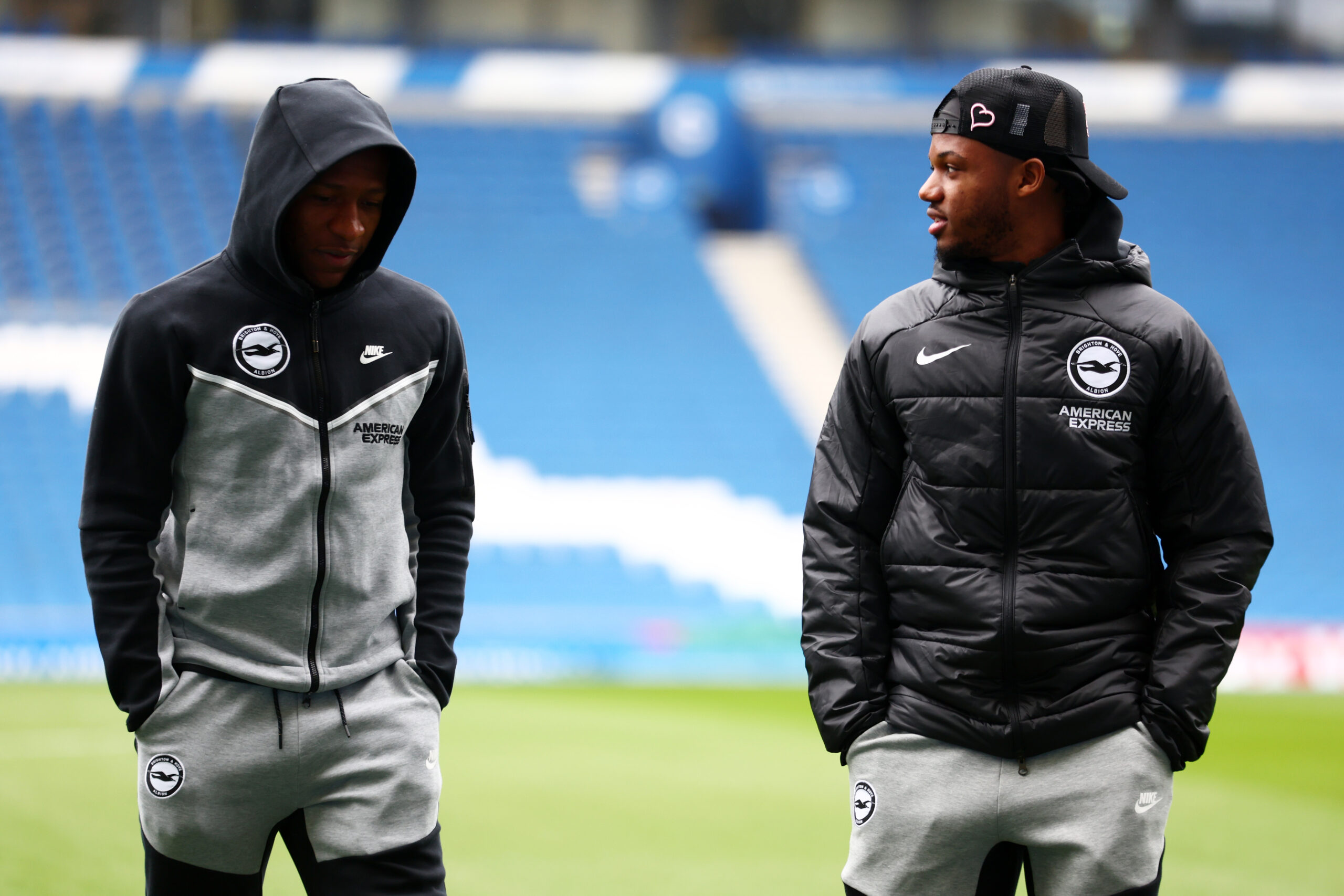 BRIGHTON, ENGLAND - FEBRUARY 03: Pervis Estupinan of Brighton & Hove Albion (L) and Ansu Fati of Brighton & Hove Albion looks on during a pitch inspection prior to during the Premier League match between Brighton & Hove Albion and Crystal Palace at American Express Community Stadium on February 03, 2024 in Brighton, England.