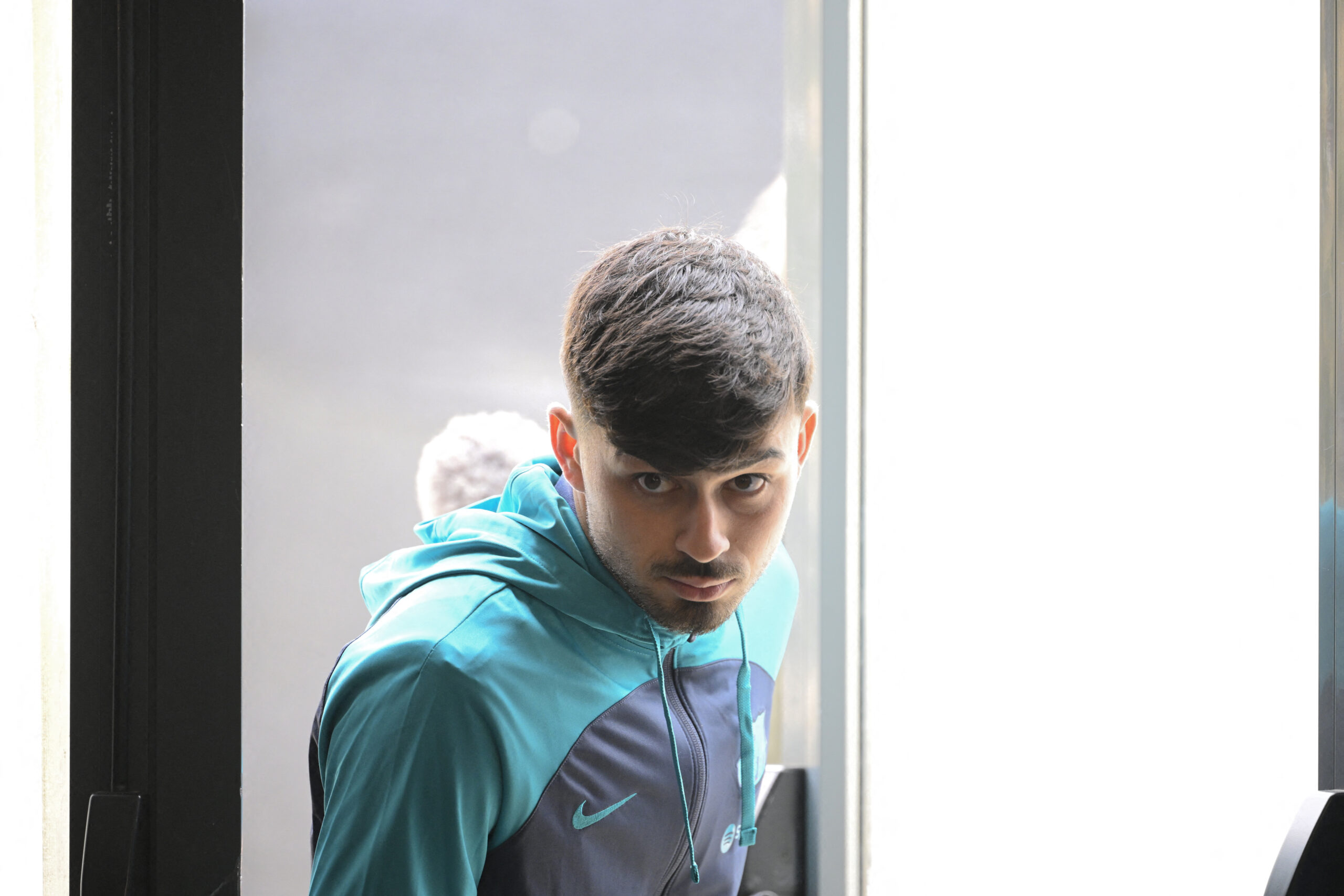 Barcelona's Spanish midfielder #08 Pedri arrives to a press conference on the eve of their UEFA Champions League quarter-final second leg football match against Paris SG at the training center in Barcelona on April 15, 2024.