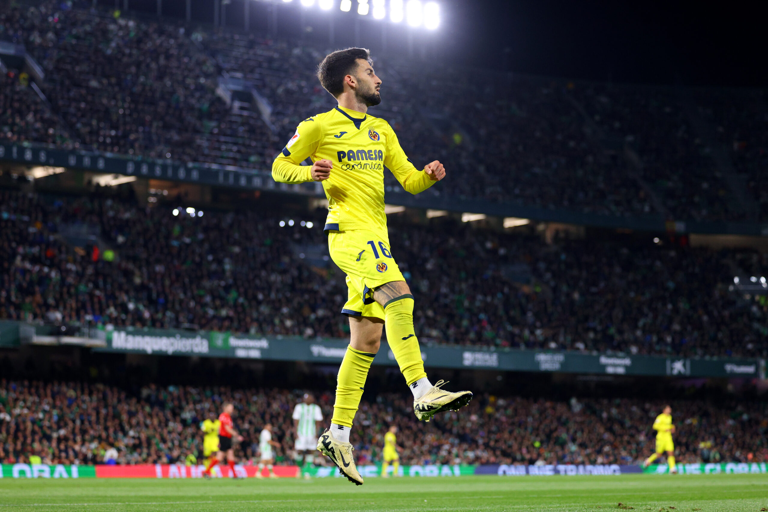 SEVILLE, SPAIN - MARCH 10: Alex Baena of Villarreal CF celebrates scoring his team's first goal during the LaLiga EA Sports match between Real Betis and Villarreal CF at Estadio Benito Villamarin on March 10, 2024 in Seville, Spain.