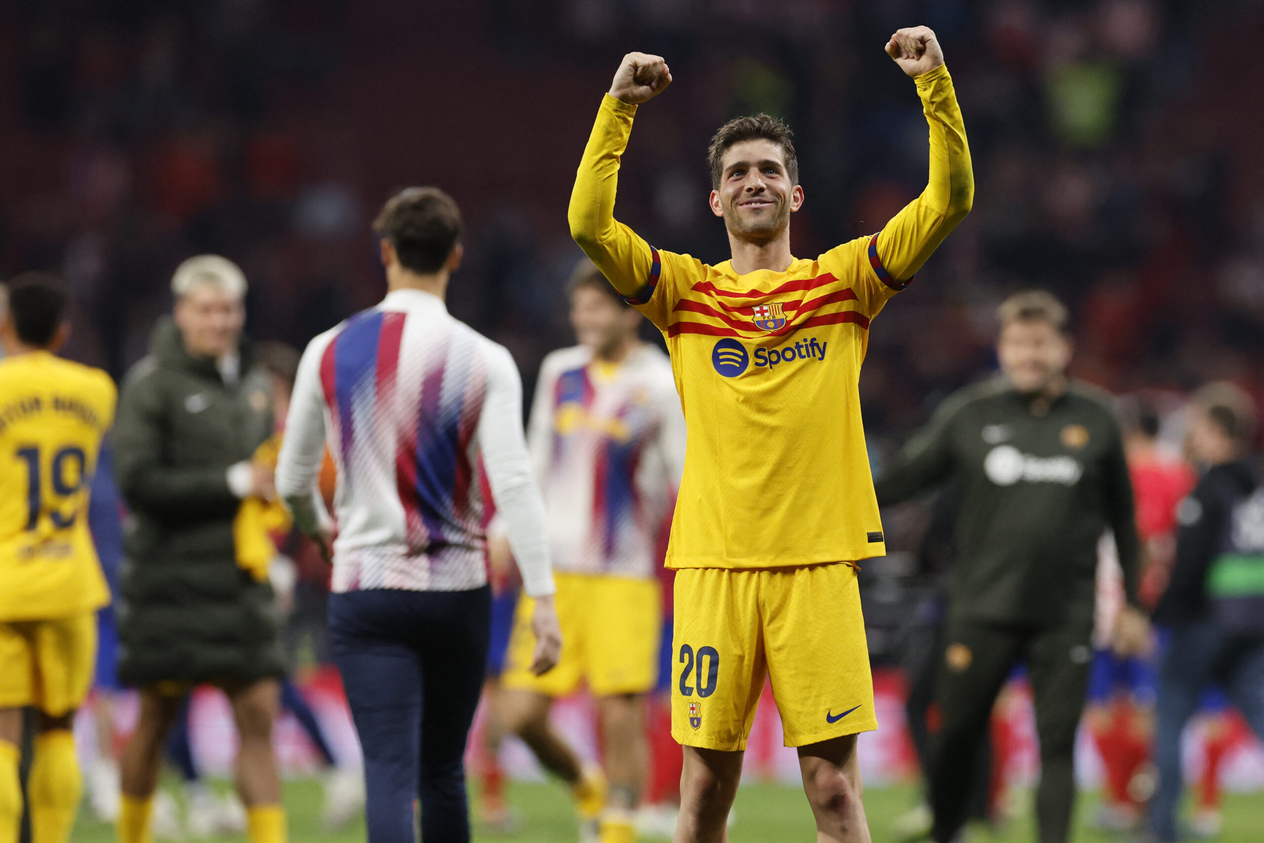 Barcelona's Spanish midfielder #20 Sergi Roberto celebrates his team's victory after the Spanish league football match between Club Atletico de Madrid and FC Barcelona at the Metropolitano stadium in Madrid on March 17, 2024.