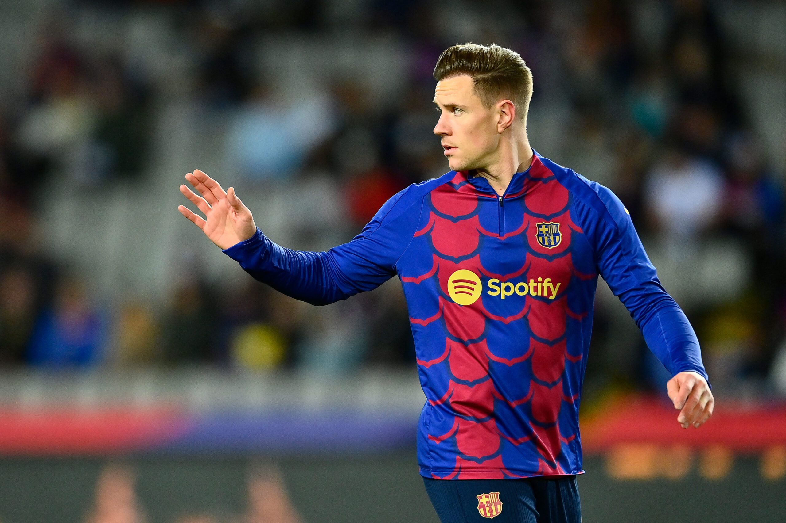 Barcelona's German goalkeeper #01 Marc-Andre ter Stegen gestures before the start of the Spanish league football match between FC Barcelona and UD Las Palmas at the Estadi Olimpic Lluis Companys in Barcelona on March 30, 2024.