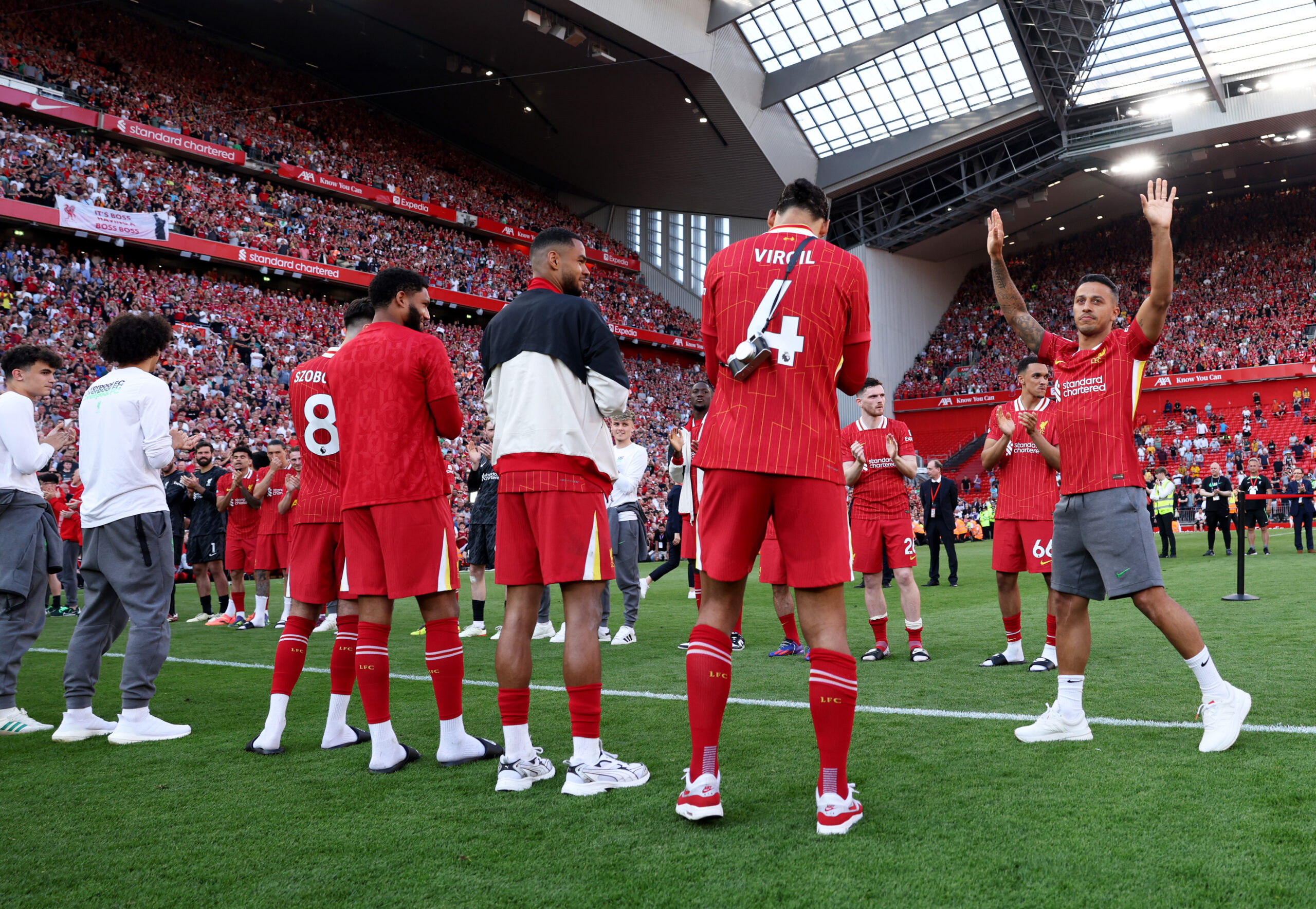 LIVERPOOL, ENGLAND - MAY 19: Players of Liverpool form a guard of honour for Thiago Alcantara of Liverpool, following his final match as a Liverpool player after the Premier League match between Liverpool FC and Wolverhampton Wanderers at Anfield on May 19, 2024 in Liverpool, England.