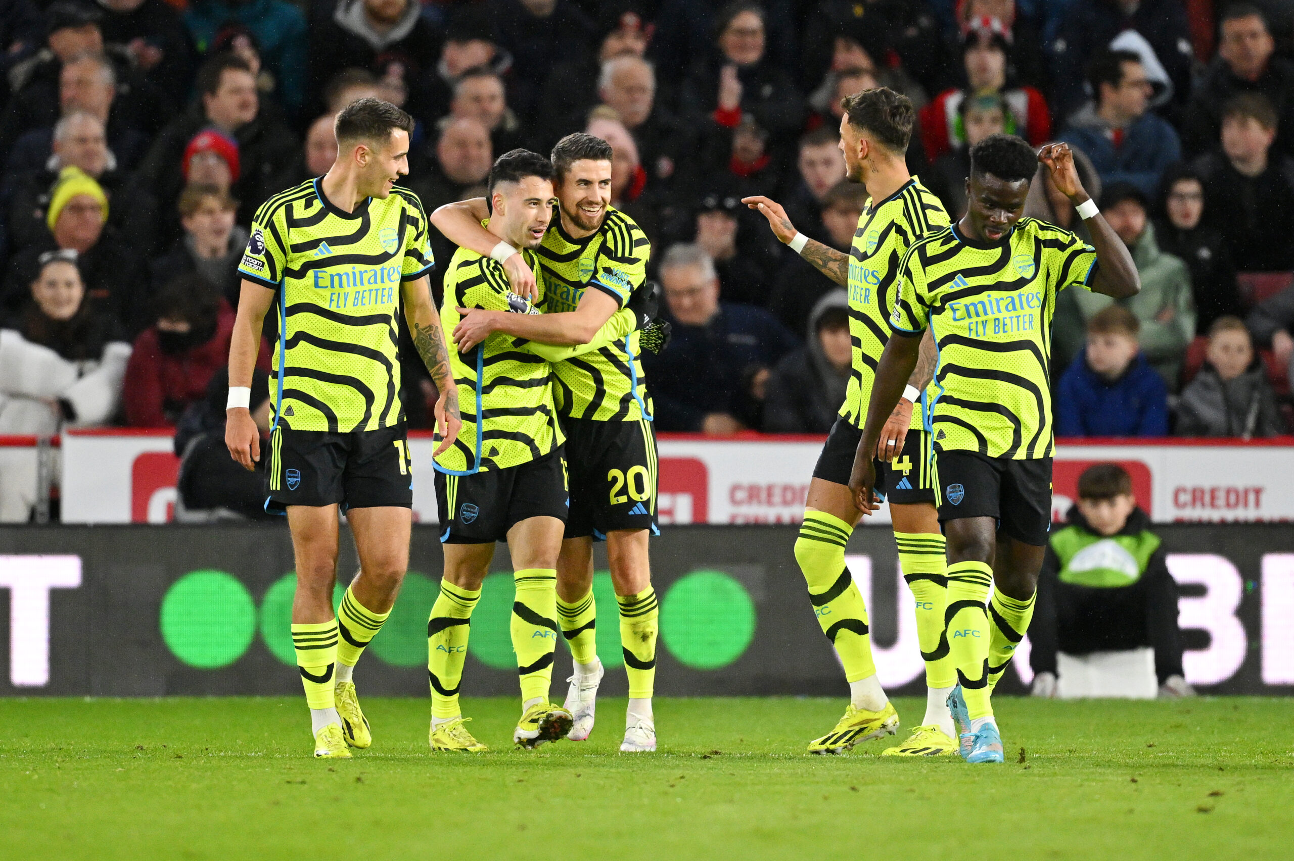 SHEFFIELD, ENGLAND - MARCH 04: Gabriel Martinelli of Arsenal celebrates with teammate Jorginho after scoring his team's third goal during the Premier League match between Sheffield United and Arsenal FC at Bramall Lane on March 04, 2024 in Sheffield, England.