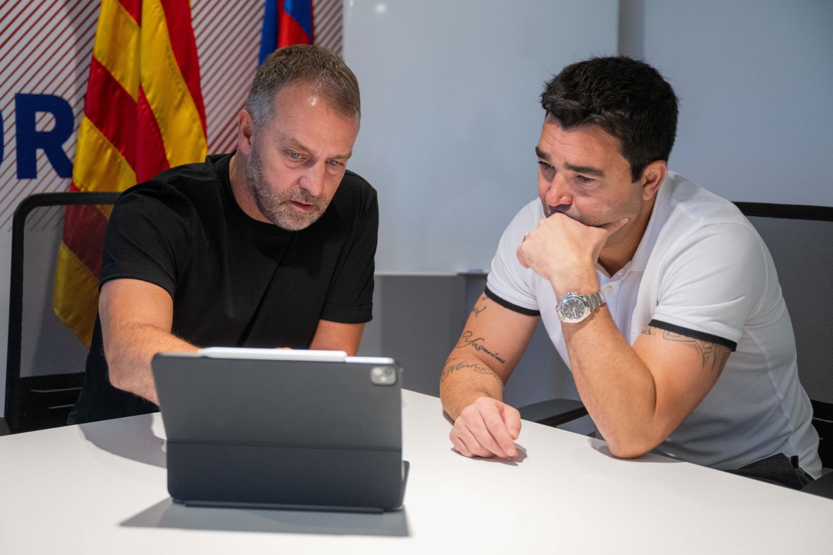 FC Barcelona head coach Hansi Flick with club director Deco planning for the 2024-2025 season.