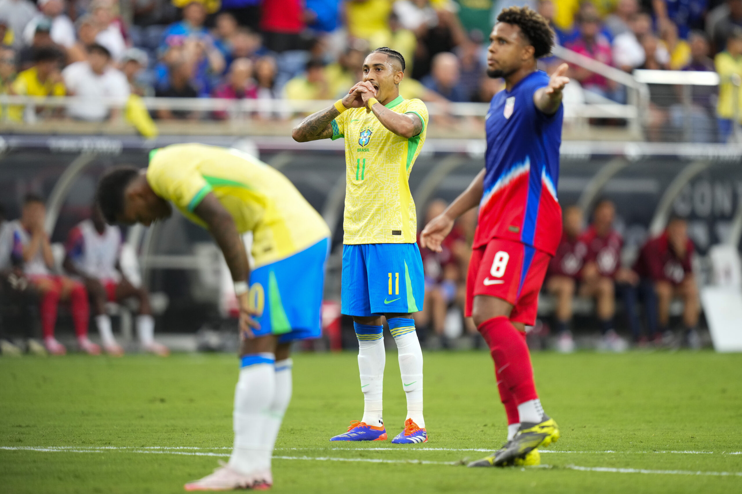 ORLANDO, FLORIDA - JUNE 12: Raphinha #11 of Brazil reacts after taking a shot against the United States during the Continental Clasico 2024 game at Camping World Stadium on June 12, 2024 in Orlando, Florida.
