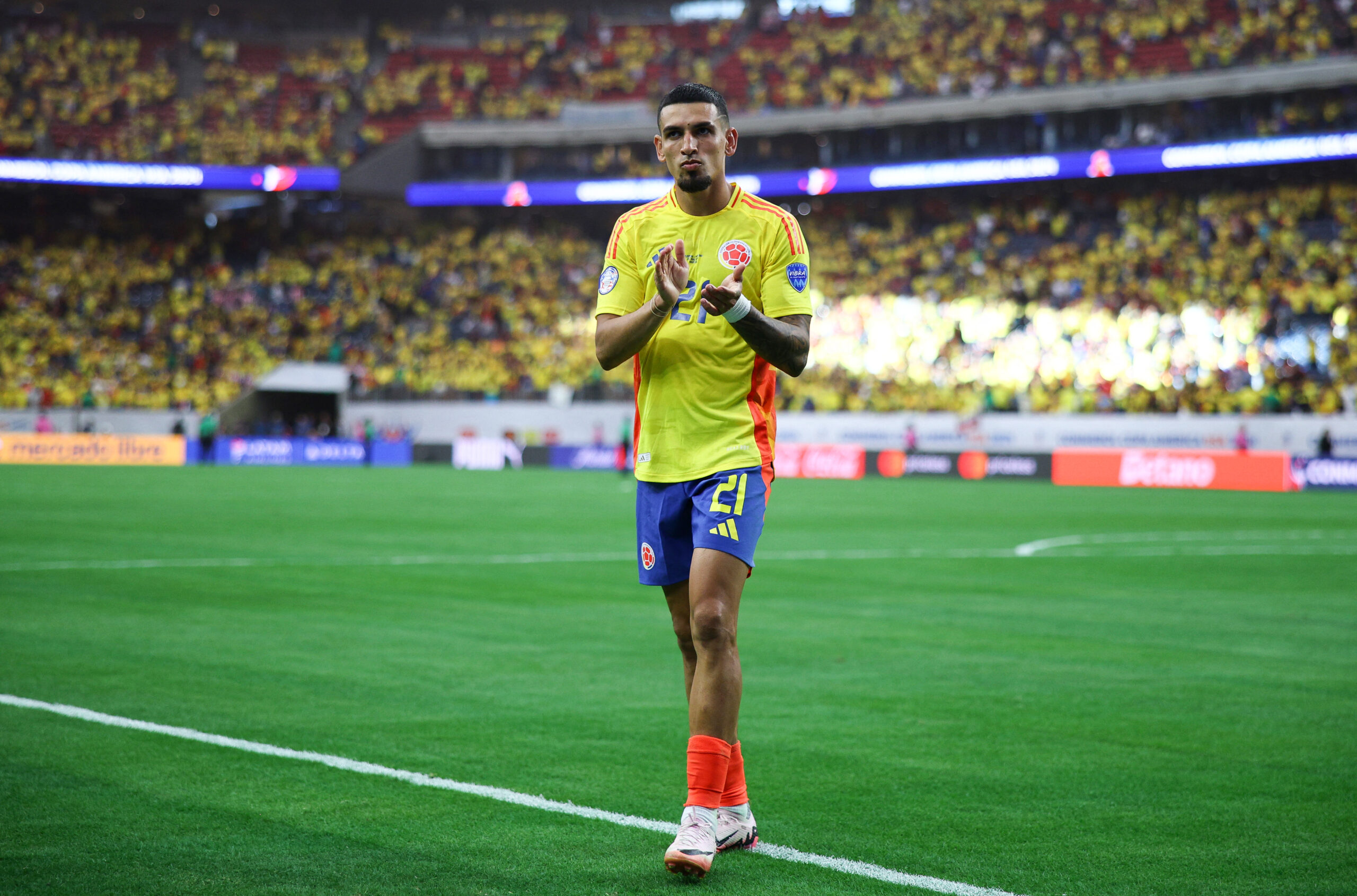 Colombia's defender #21 Daniel Munoz walks off the pitch after the Conmebol 2024 Copa America tournament group D football match between Colombia and Paraguay at NRG Stadium in Houston, Texas on June 24, 2024.