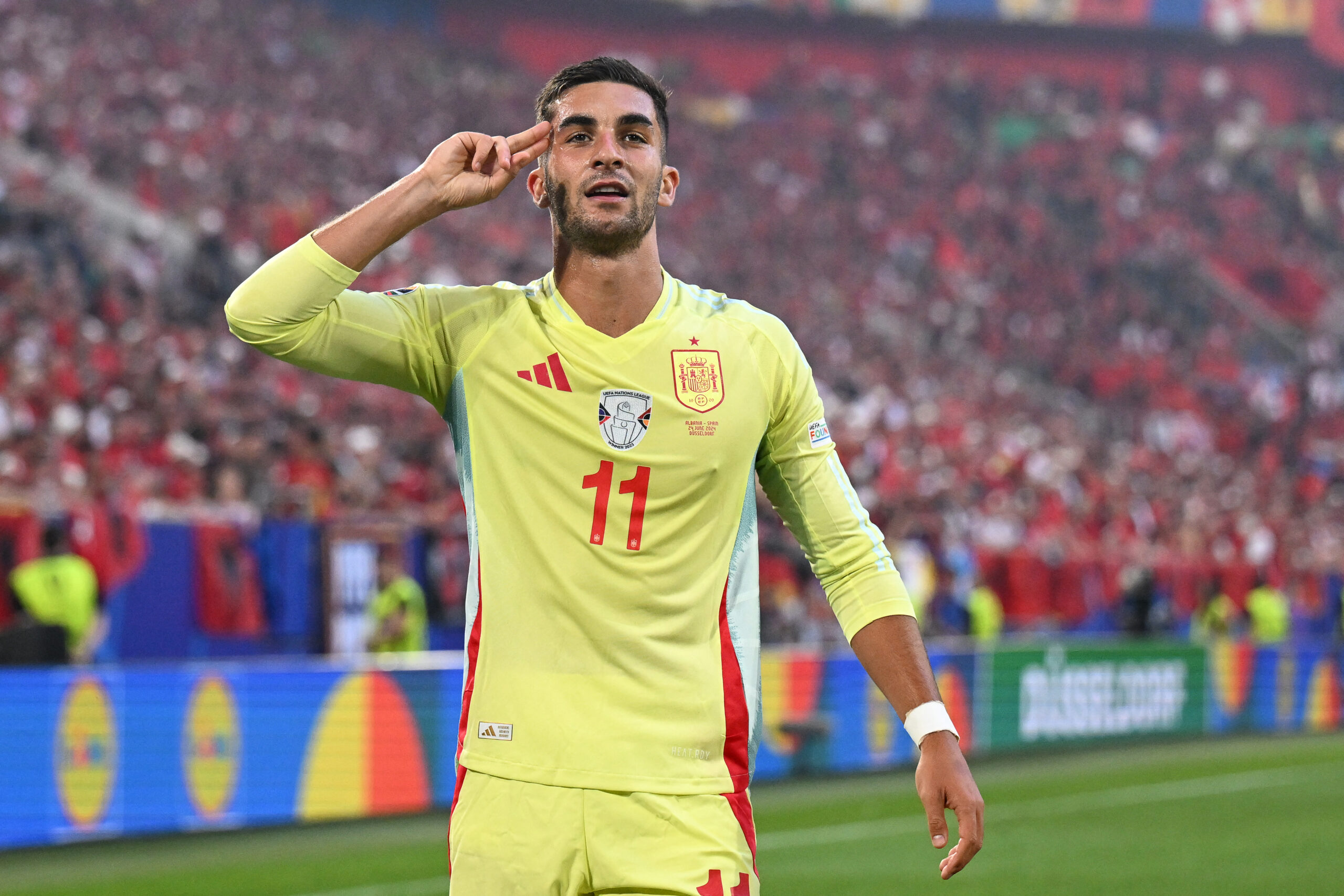 Spain's forward #11 Ferran Torres celebrates scoring his team's first goal during the UEFA Euro 2024 Group B football match between Albania and Spain at the Duesseldorf Arena in Duesseldorf on June 24, 2024.