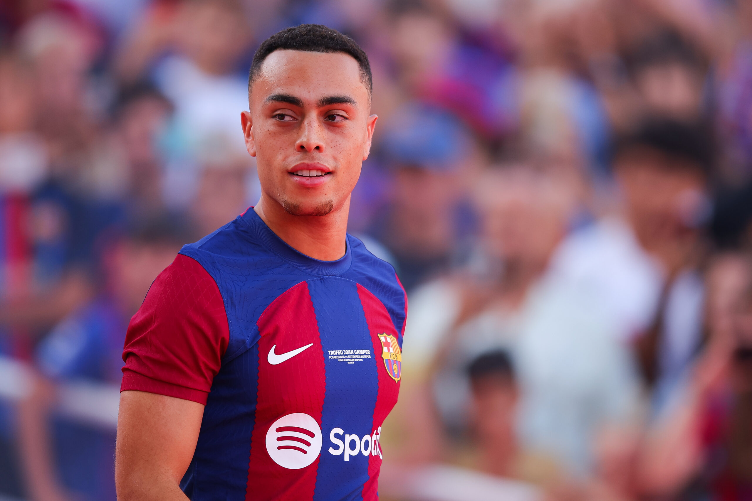 BARCELONA, SPAIN - AUGUST 08: Sergiño Dest of FC Barcelona waves the supporters during the presentation prior to the Joan Gamper Trophy match between FC Barcelona and Tottenham Hotspur at Estadi Olimpic Lluis Companys on August 08, 2023 in Barcelona, Spain.