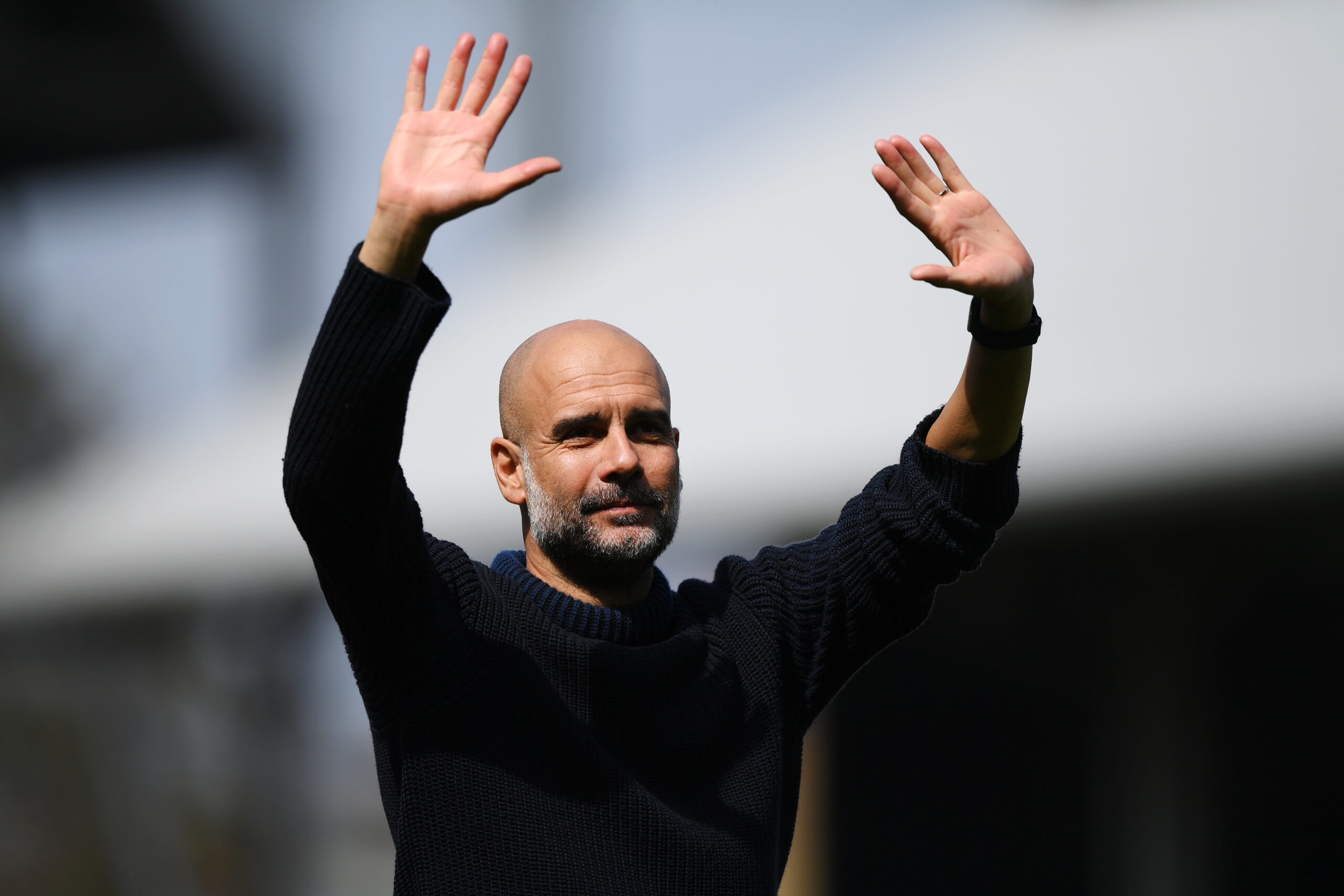LONDON, ENGLAND - MAY 11: Pep Guardiola, Manager of Manchester City, acknowledges the fans following the Premier League match between Fulham FC and Manchester City at Craven Cottage on May 11, 2024 in London, England.