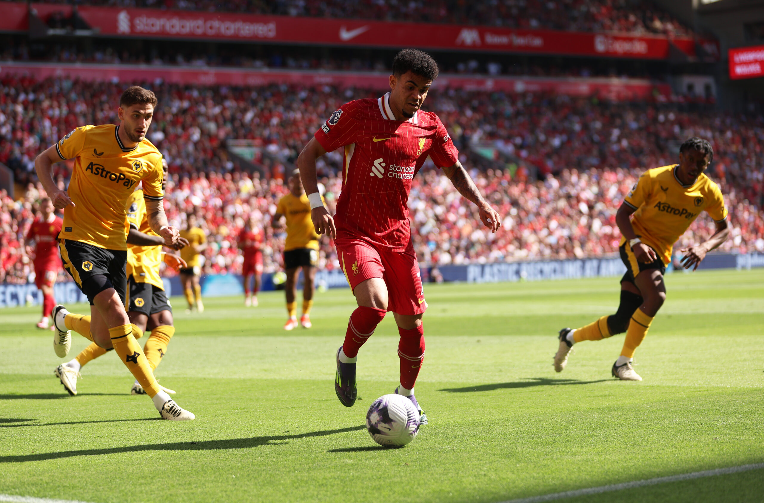 LIVERPOOL, ENGLAND - MAY 19: Luis Diaz of Liverpool on the ball during the Premier League match between Liverpool FC and Wolverhampton Wanderers at Anfield on May 19, 2024 in Liverpool, England.