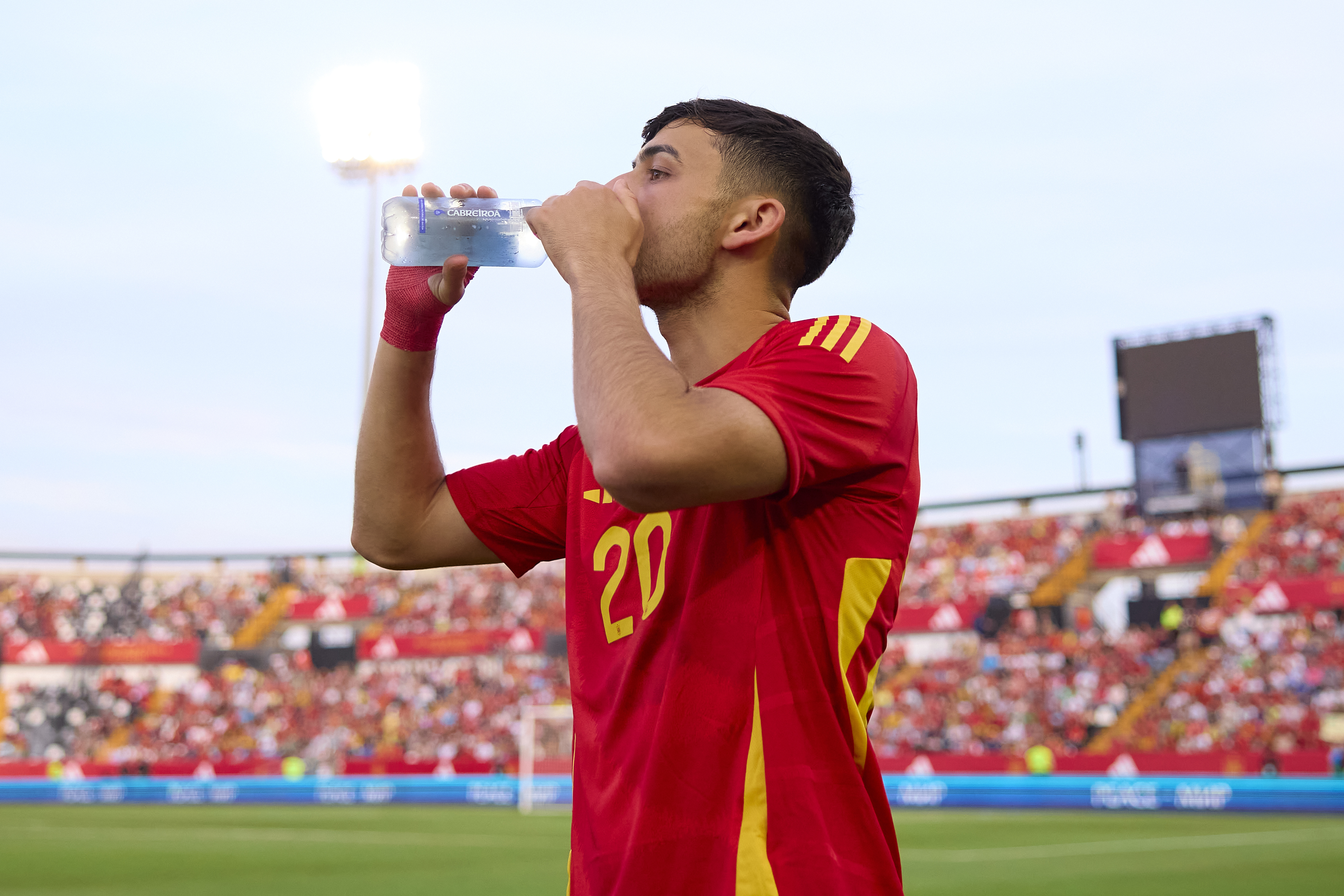 BADAJOZ, SPAIN - JUNE 05: Pedri of Spain drinks some water before an International Friendly Match between Spain and Andorra at Nuevo Vivero on June 05, 2024 in Badajoz, Spain.