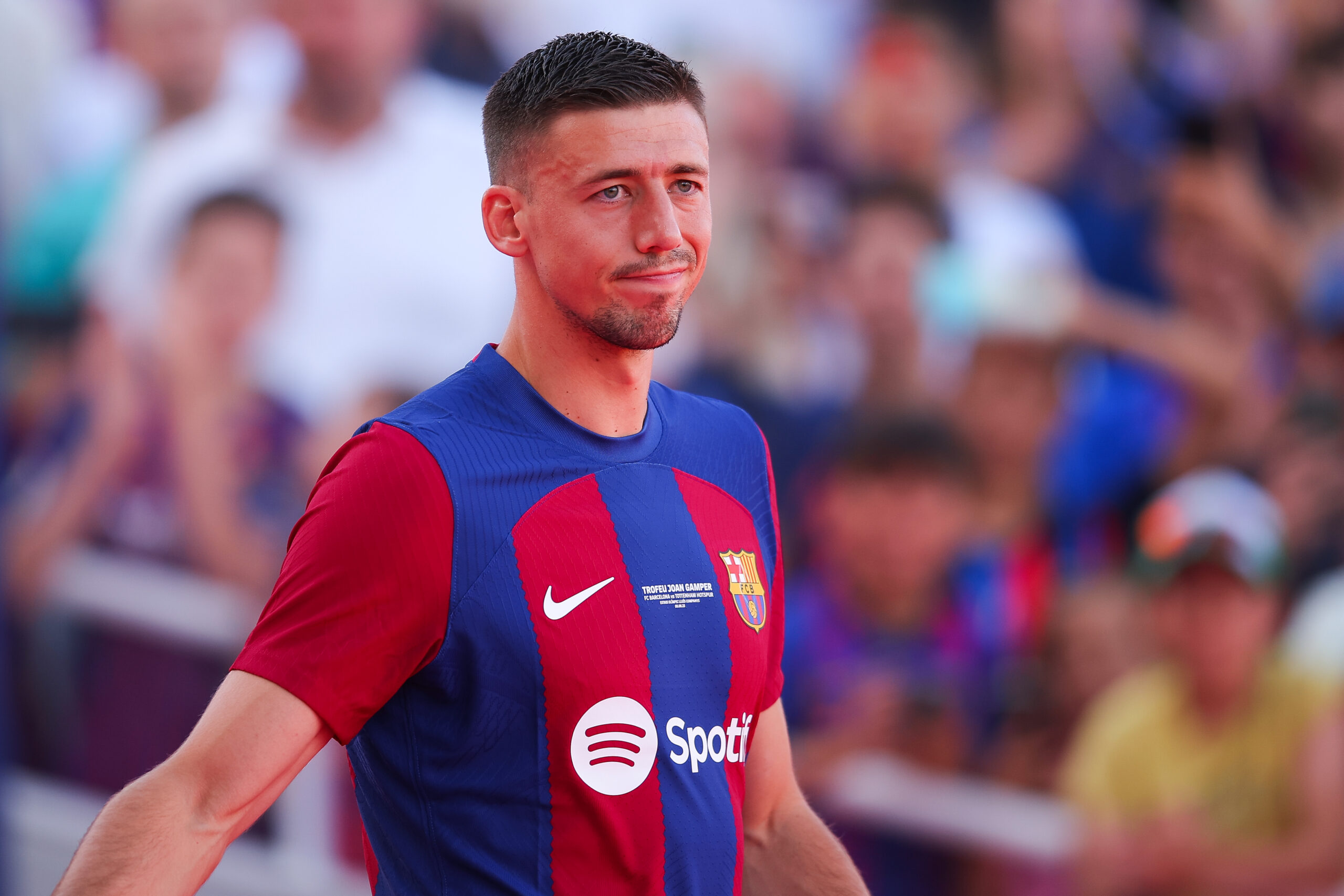 BARCELONA, SPAIN - AUGUST 08: Clement Lenglet of FC Barcelona waves the supporters during the presentation prior to the Joan Gamper Trophy match between FC Barcelona and Tottenham Hotspur at Estadi Olimpic Lluis Companys on August 08, 2023 in Barcelona, Spain.