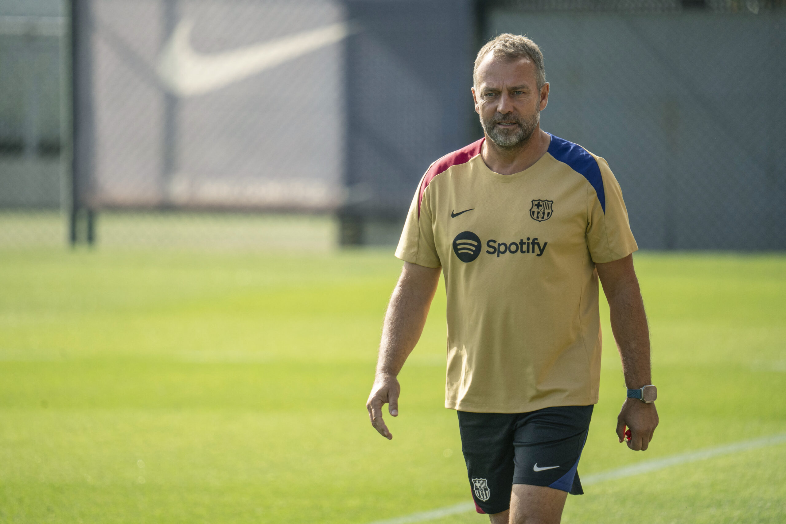 Barcelona's German coach Hansi Flick attends his first training session as Barcelona's new head coach at the Joan Gamper training ground in Sant Joan Despi, near Barcelona, on July 19, 2024. Former German coach of Bayern Munich Hansi Flick was appointed on May 29, 2024, as new Barcelona's coach on a deal which runs till June 2026, after sacking Xavi Hernandez.