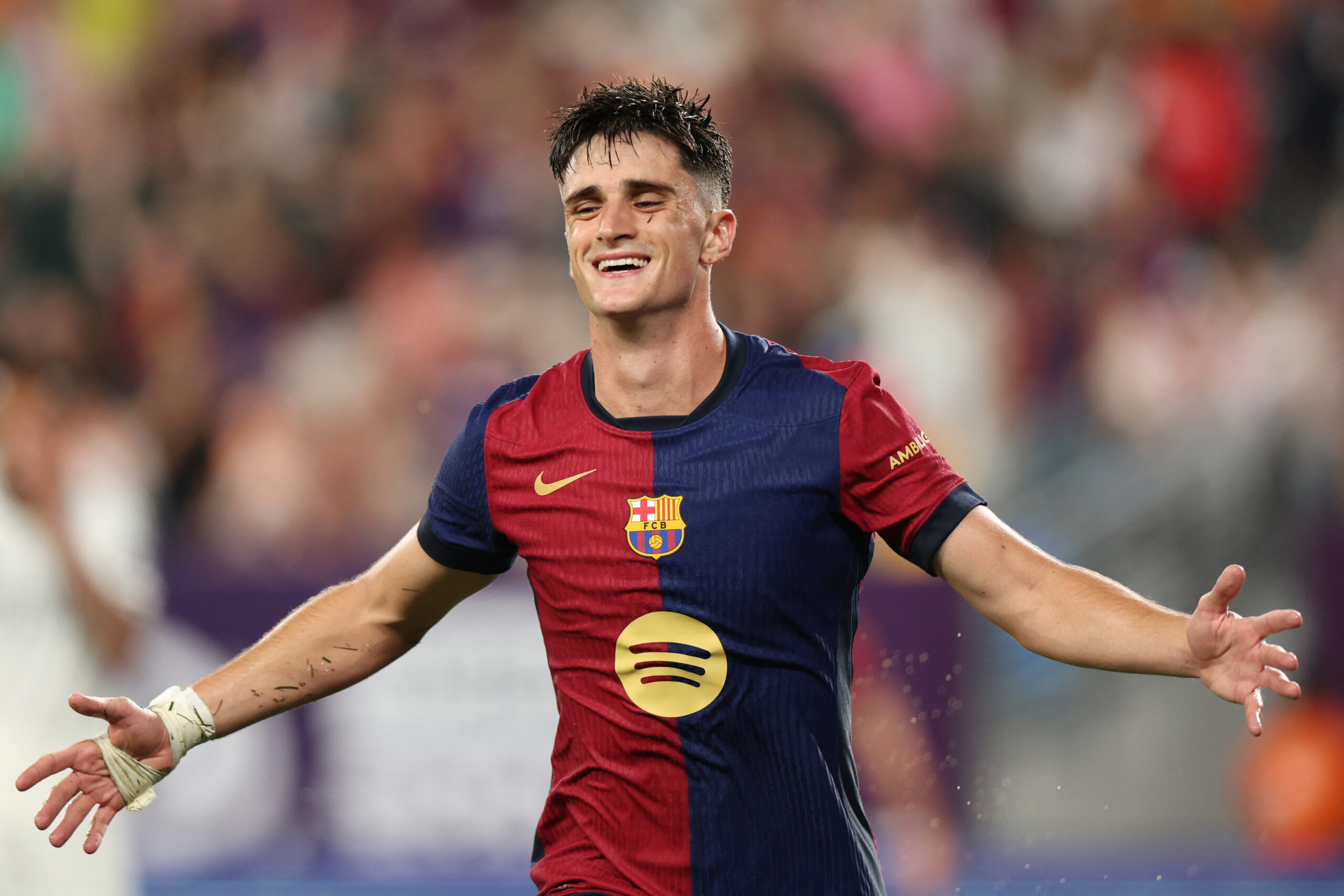 Barcelona's Spanish forward #08 Pau Victor celebrates after scoring a goal during the pre-season club friendly football match between Real Madrid and Barcelona at MetLife Stadium in East Rutherford, New Jersey, August 3, 2024.